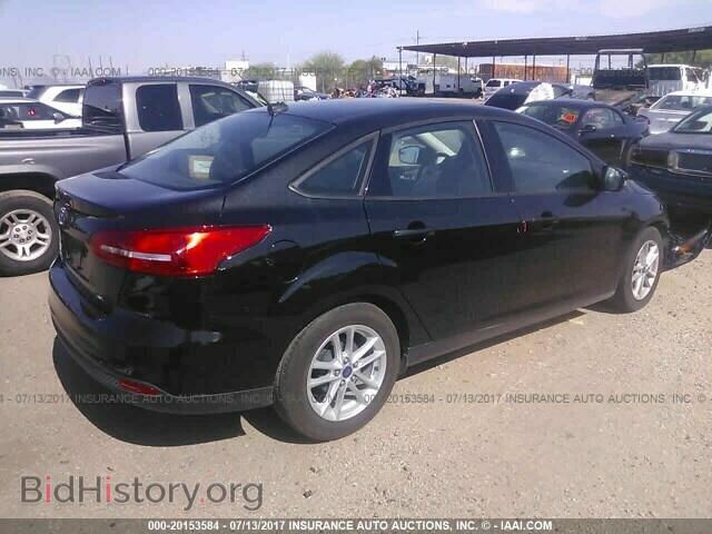 2015 Ford Focus - VIN: 1FADP3F2XFL327302 - Photo 4