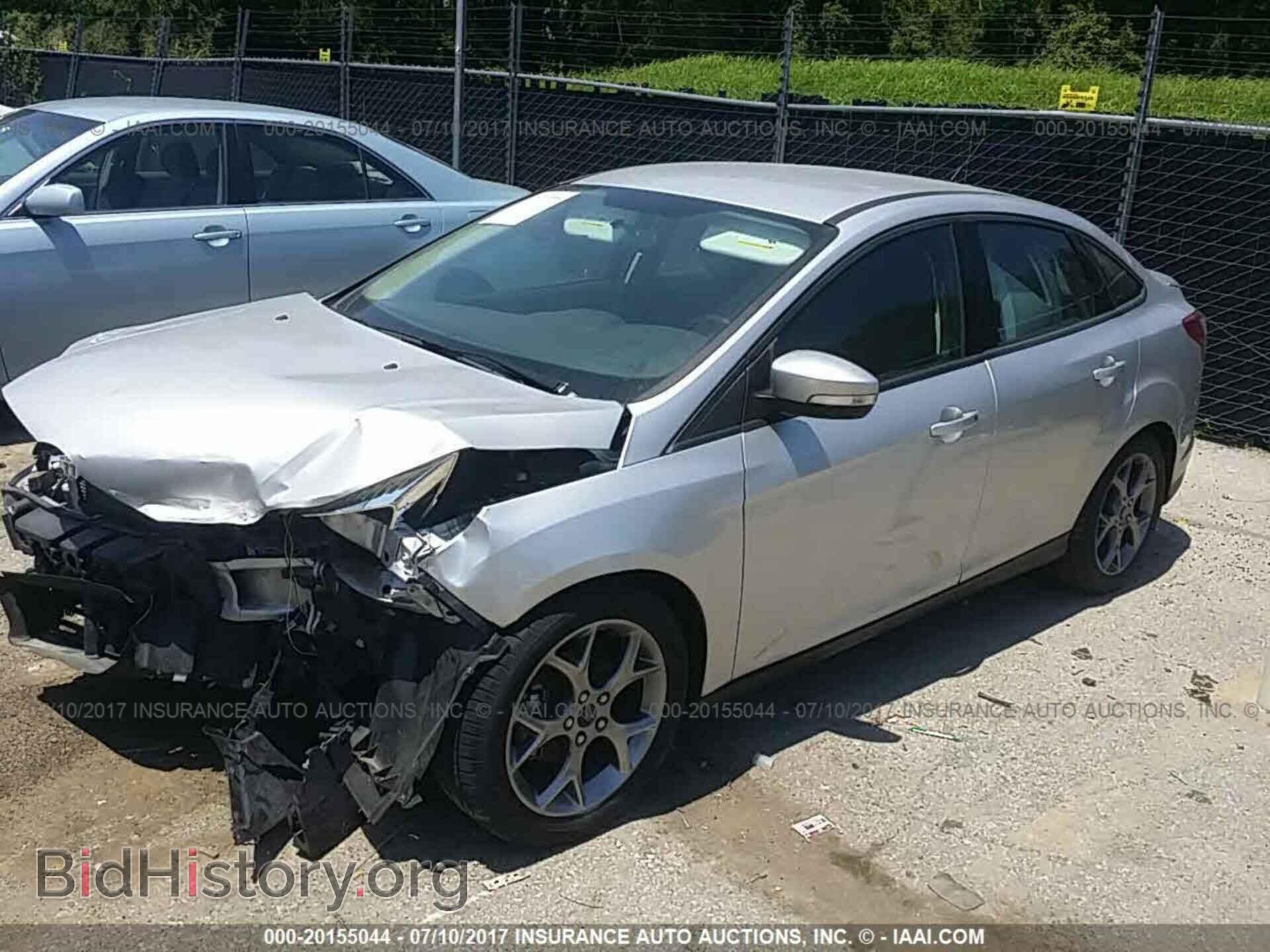 2014 Ford Focus - VIN: 1FADP3F2XEL390429 - Фото 2