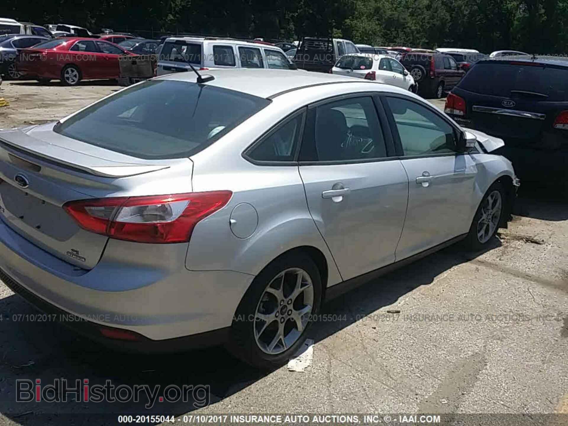 2014 Ford Focus - VIN: 1FADP3F2XEL390429 - Фото 4