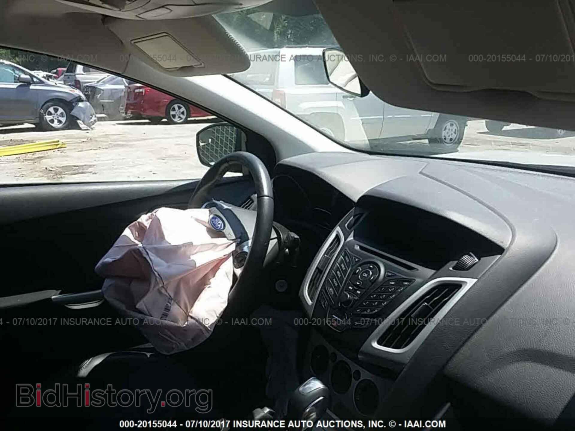 2014 Ford Focus - VIN: 1FADP3F2XEL390429 - Фото 5