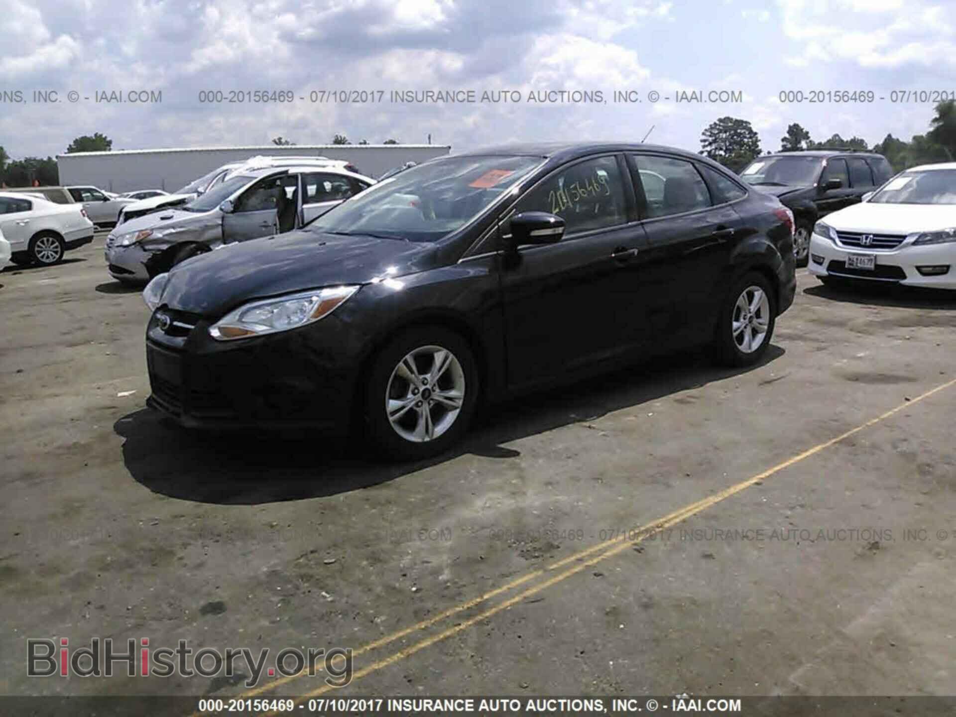 2014 Ford Focus - VIN: 1FADP3F22EL147696 - Фото 2