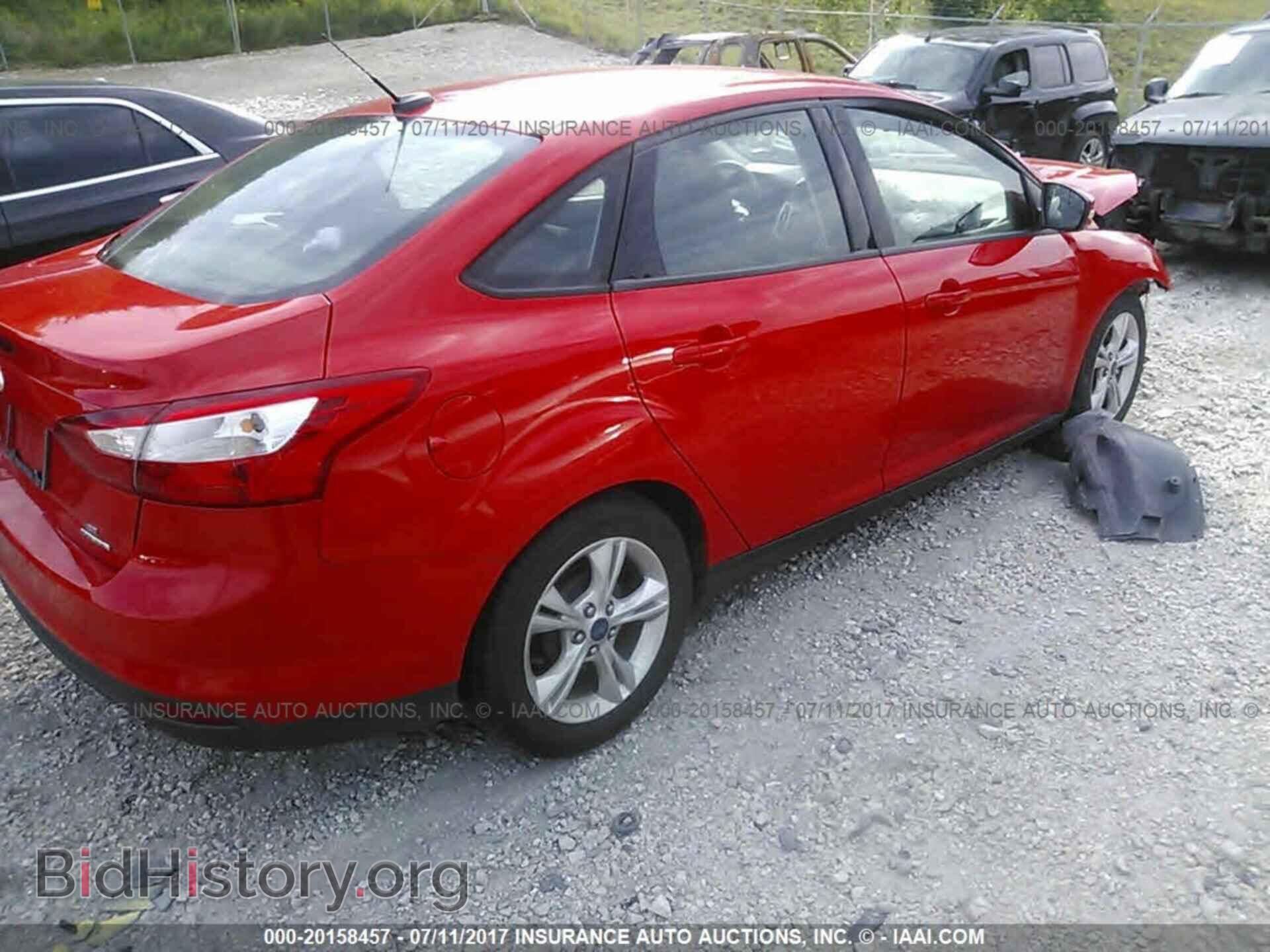 2014 Ford Focus - VIN: 1FADP3F20EL154212 - Фото 4