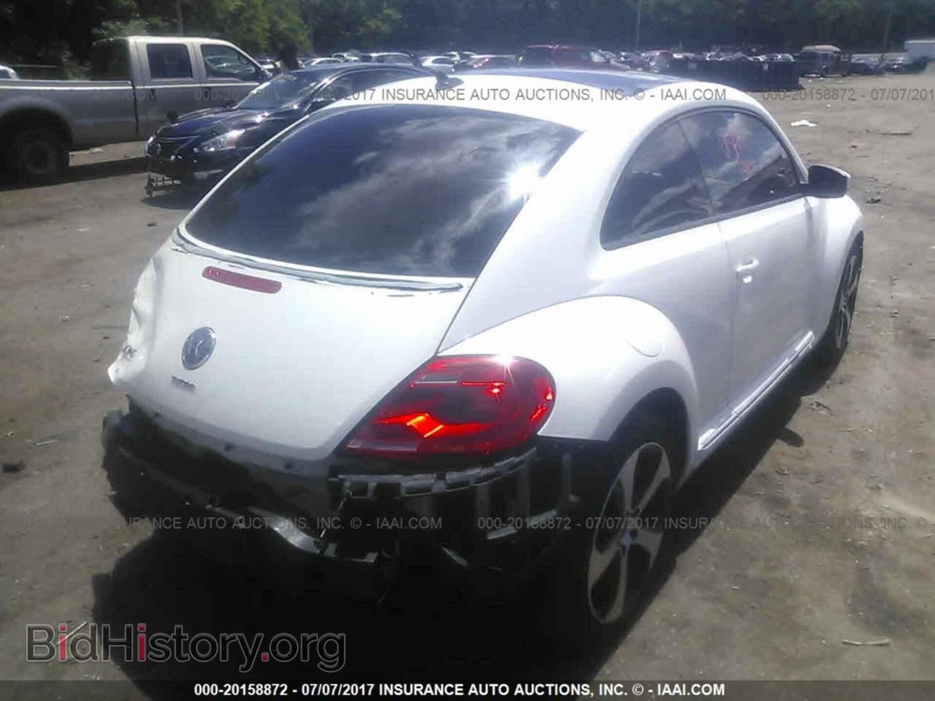 2012 Volkswagen Beetle - VIN: 3VWJP7AT5CM646067 - Фото 4