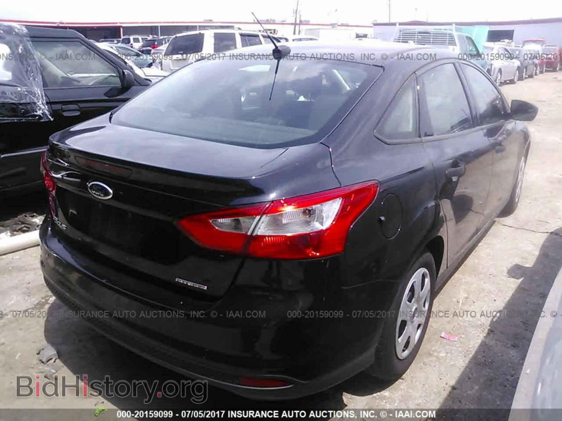 2013 Ford Focus - VIN: 1FADP3E2XDL169557 - Photo 4
