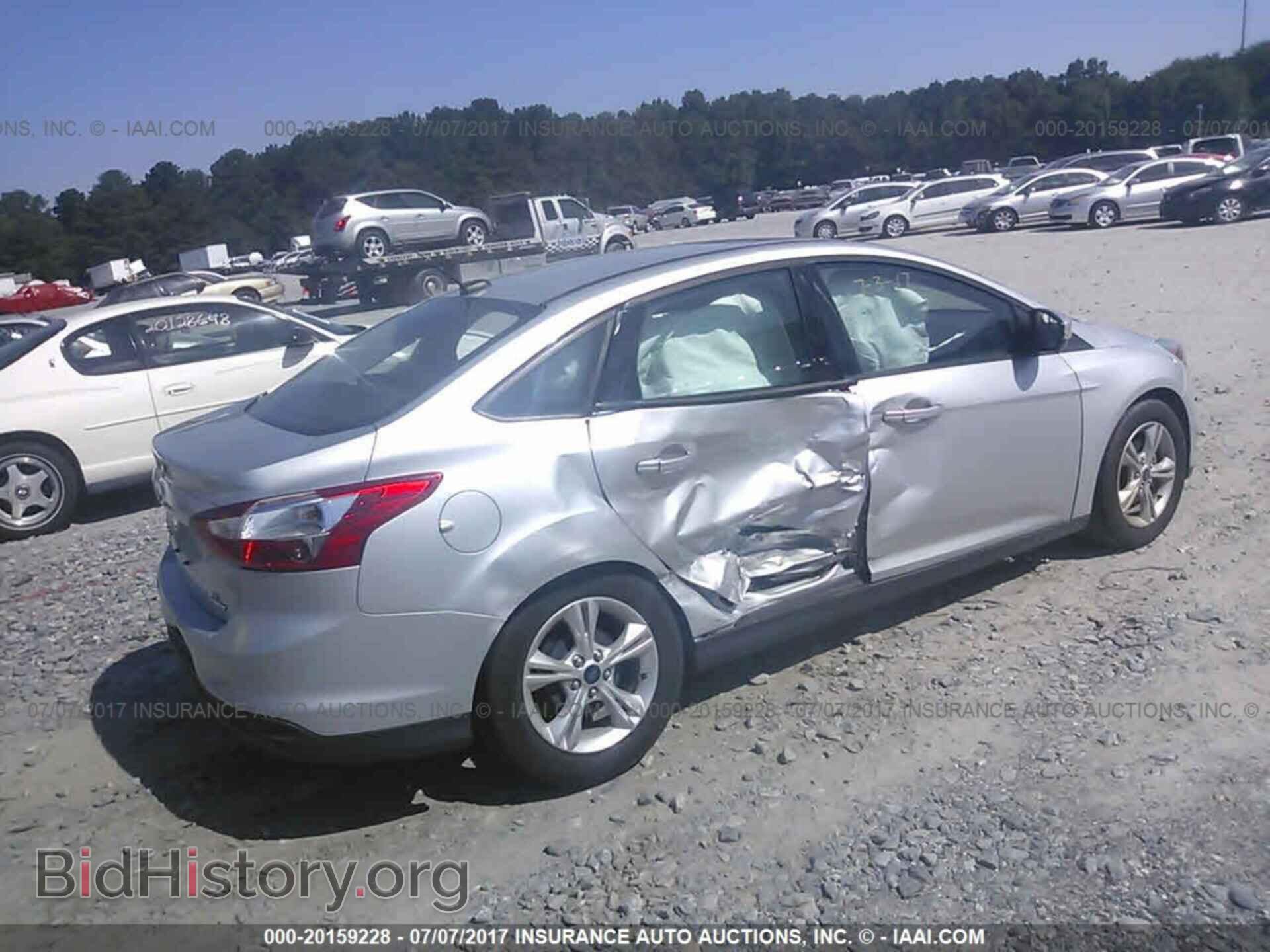 2014 Ford Focus - VIN: 1FADP3F20EL359478 - Photo 4