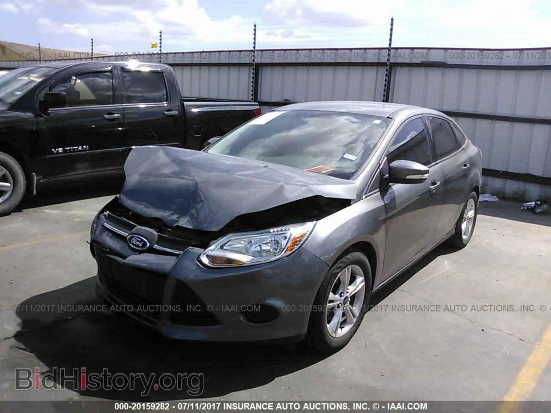 2014 Ford Focus - VIN: 1FADP3F20EL259302 - Фото 2