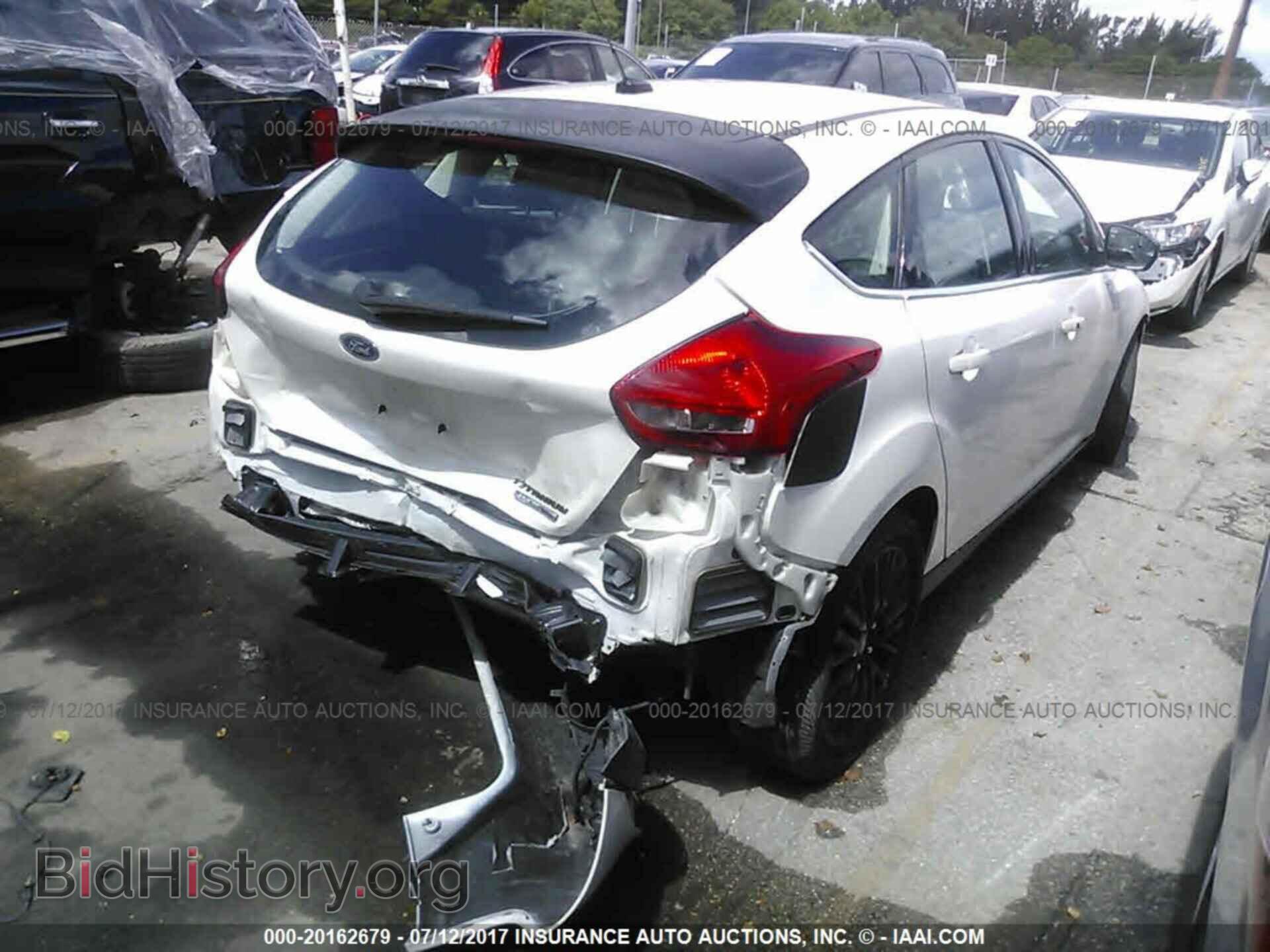 2016 Ford Focus - VIN: 1FADP3N2XGL205977 - Photo 4