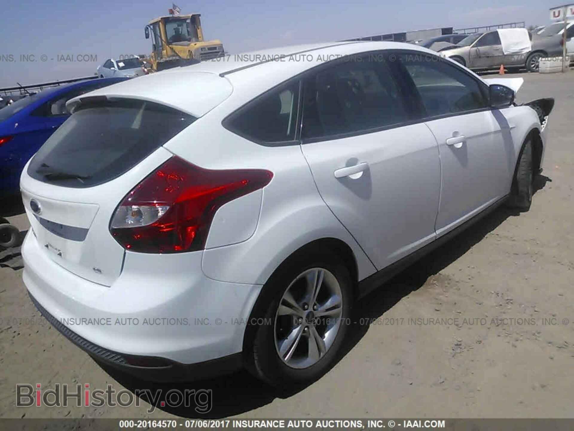 2014 Ford Focus - VIN: 1FADP3K21EL162163 - Фото 4
