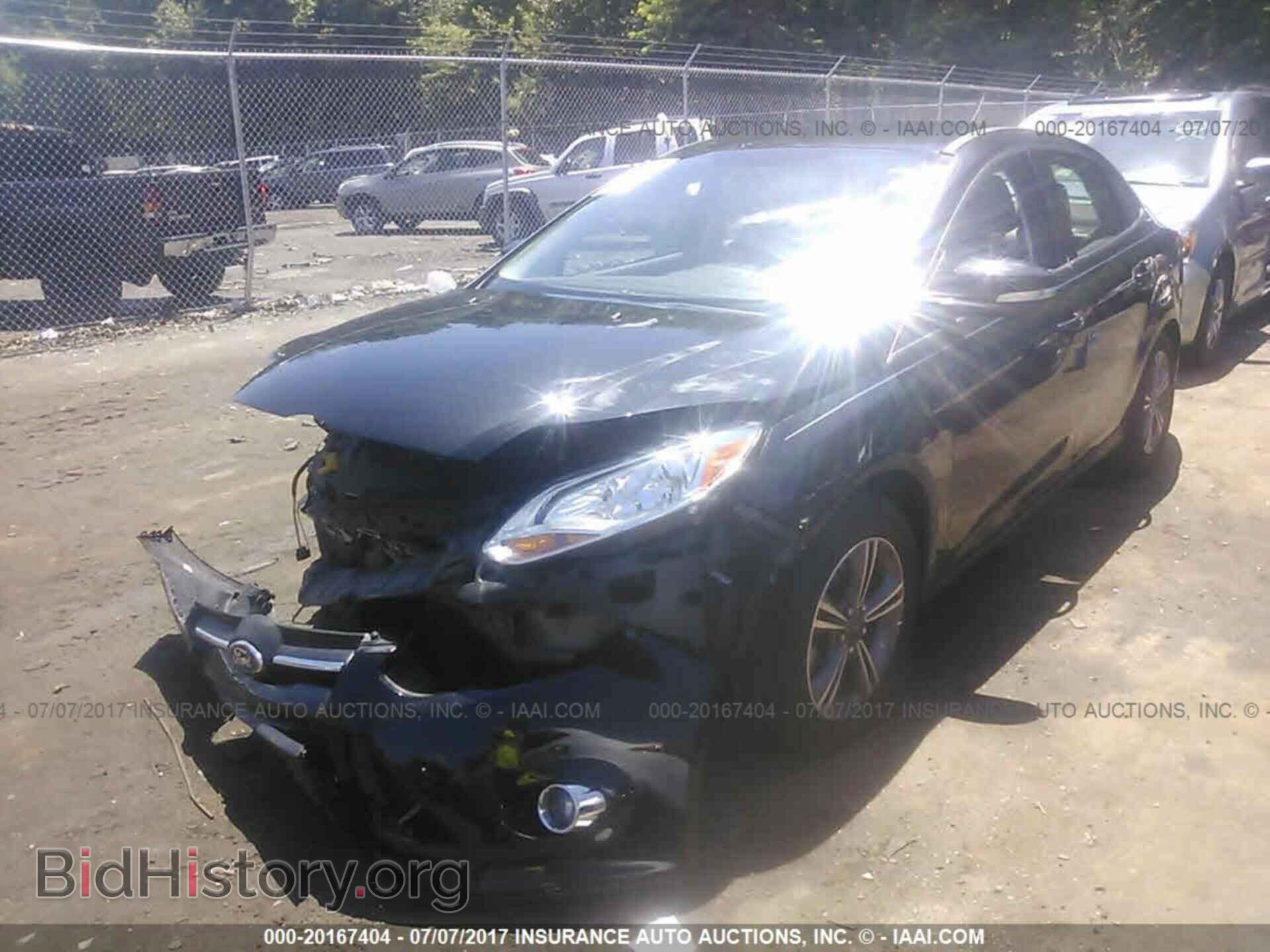 2014 Ford Focus - VIN: 1FADP3F28EL424867 - Photo 2