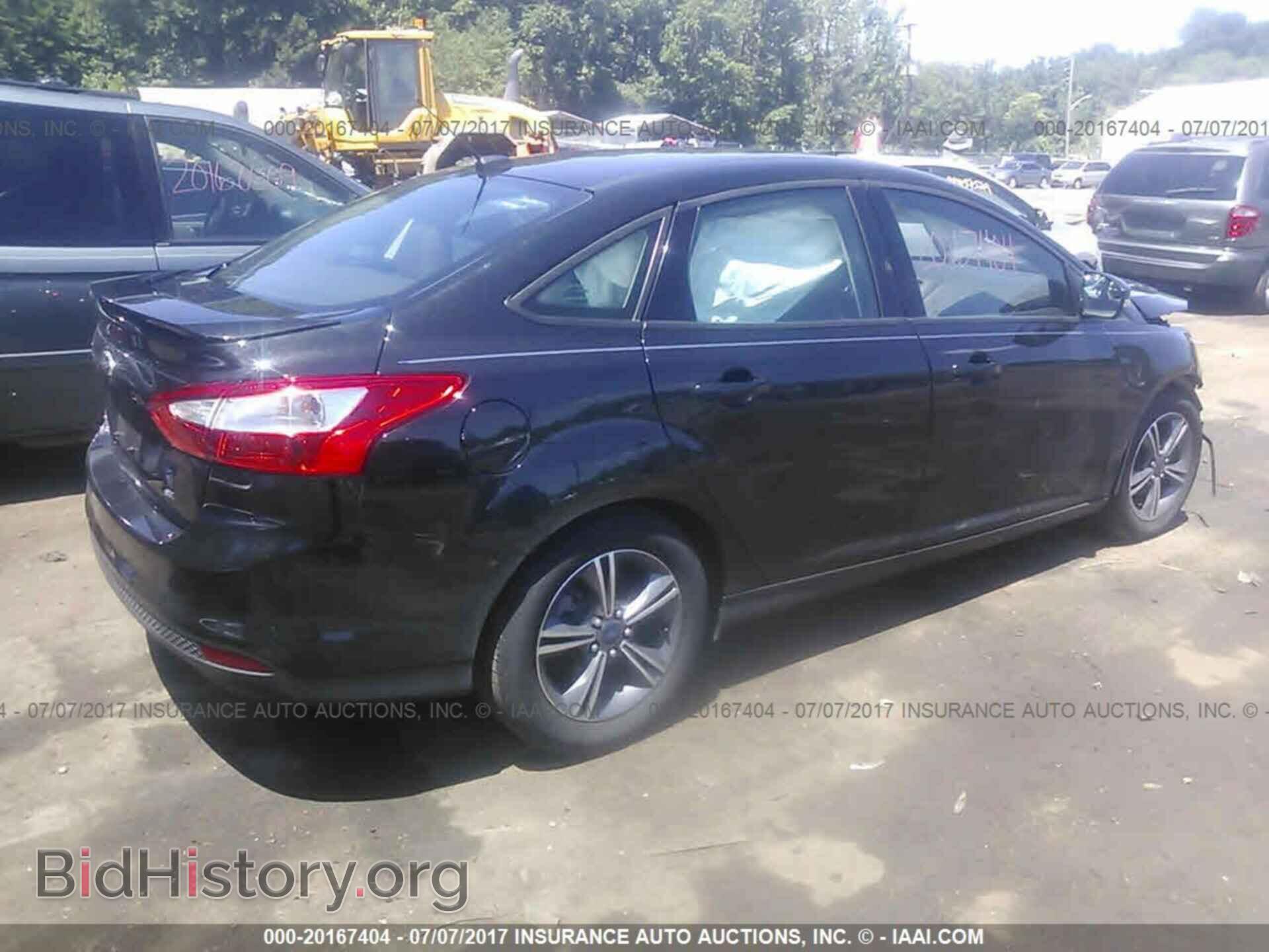 2014 Ford Focus - VIN: 1FADP3F28EL424867 - Photo 4
