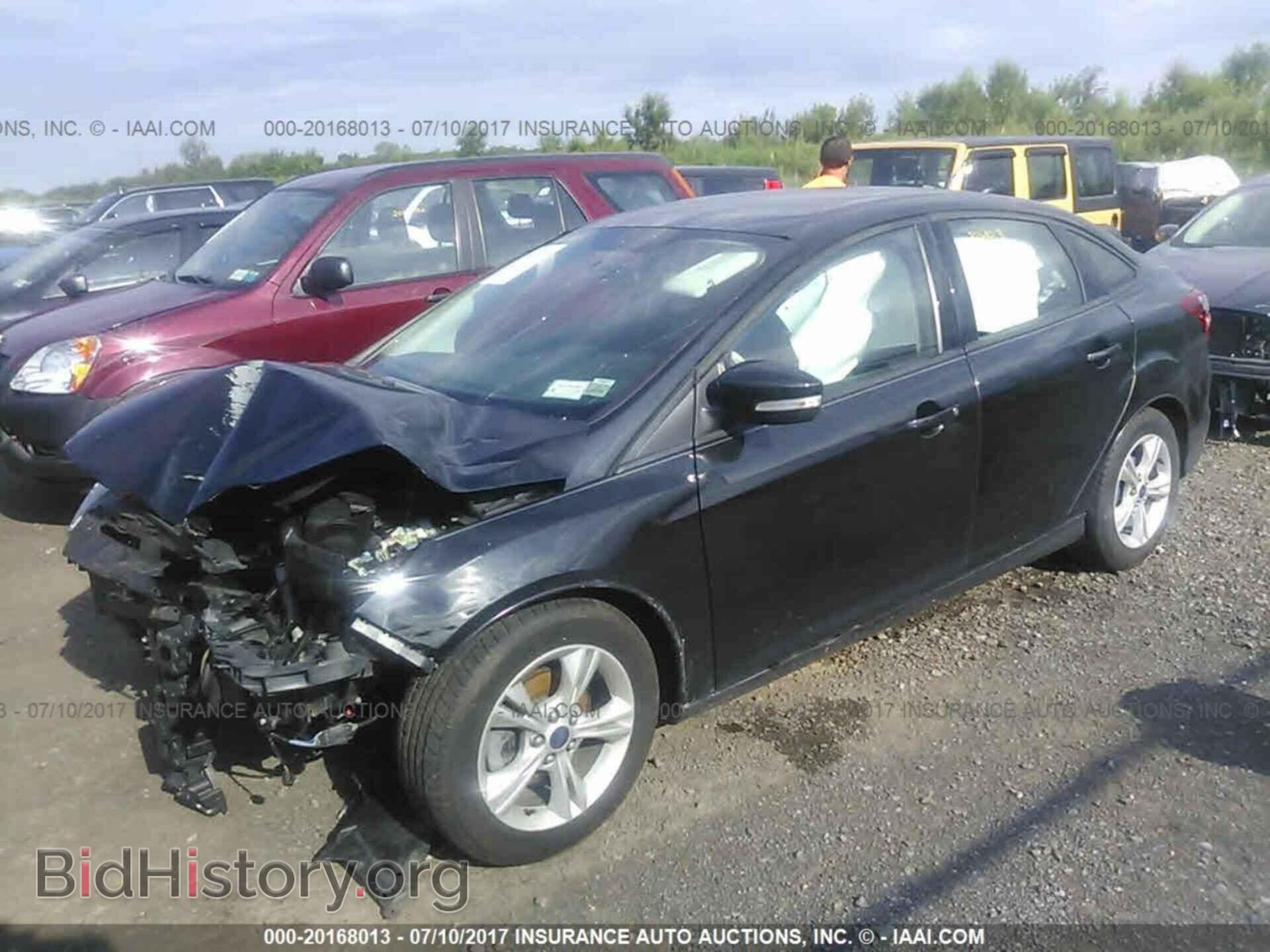 2014 Ford Focus - VIN: 1FADP3F26EL424818 - Photo 2