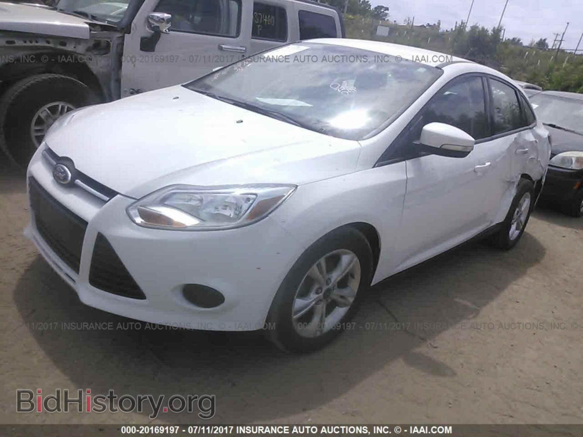 2014 Ford Focus - VIN: 1FADP3F28EL374018 - Фото 2