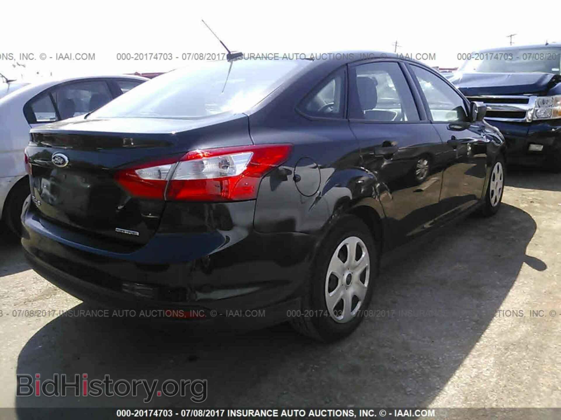 2013 Ford Focus - VIN: 1FADP3E29DL380989 - Photo 4