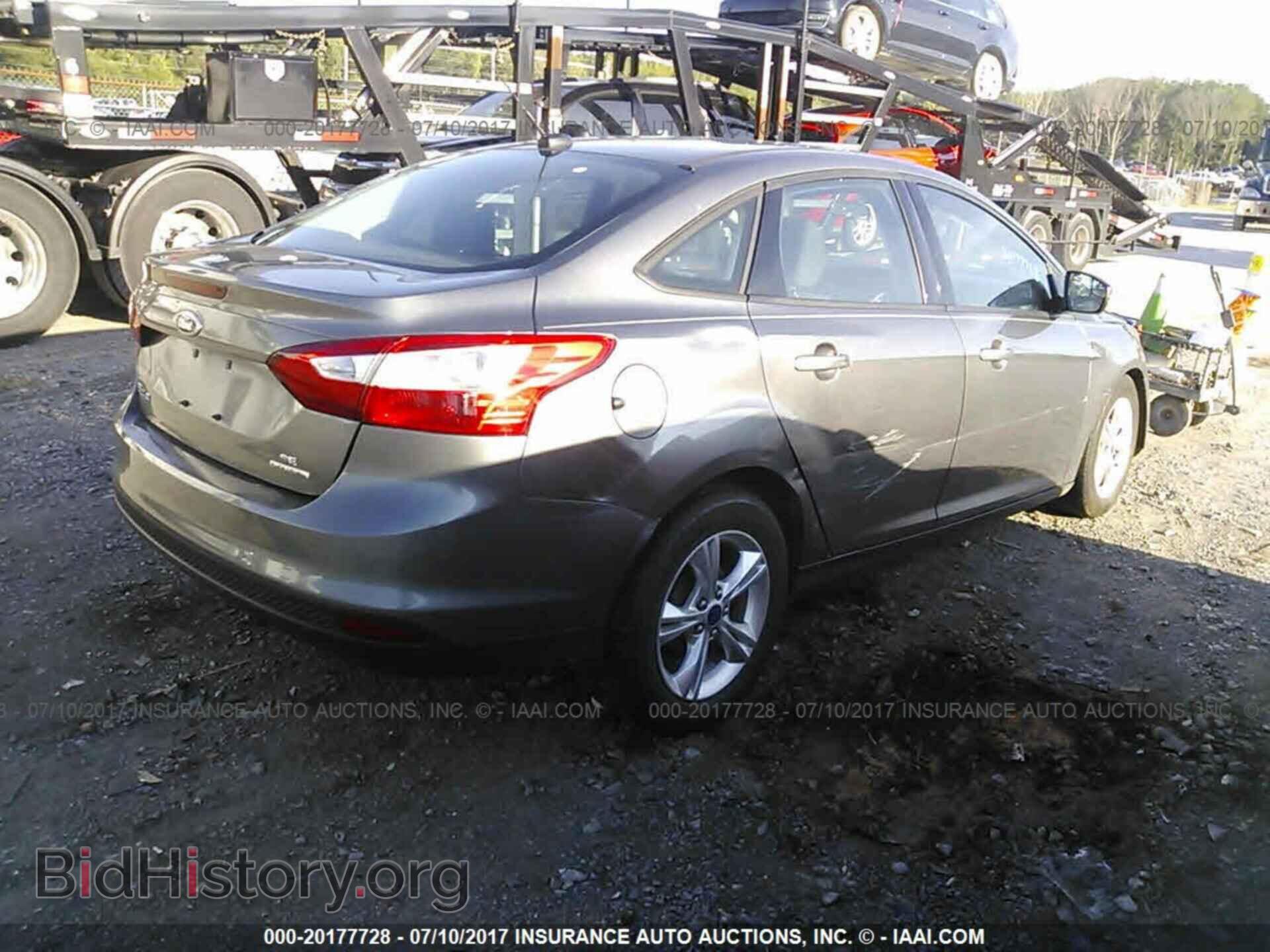 2014 Ford Focus - VIN: 1FADP3F23EL152745 - Photo 4