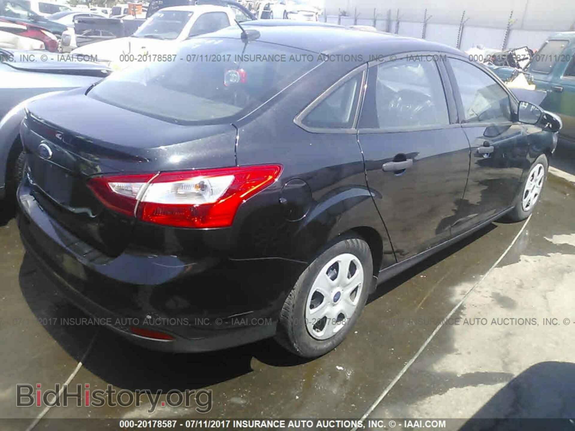 2014 Ford Focus - VIN: 1FADP3E28EL382475 - Фото 4