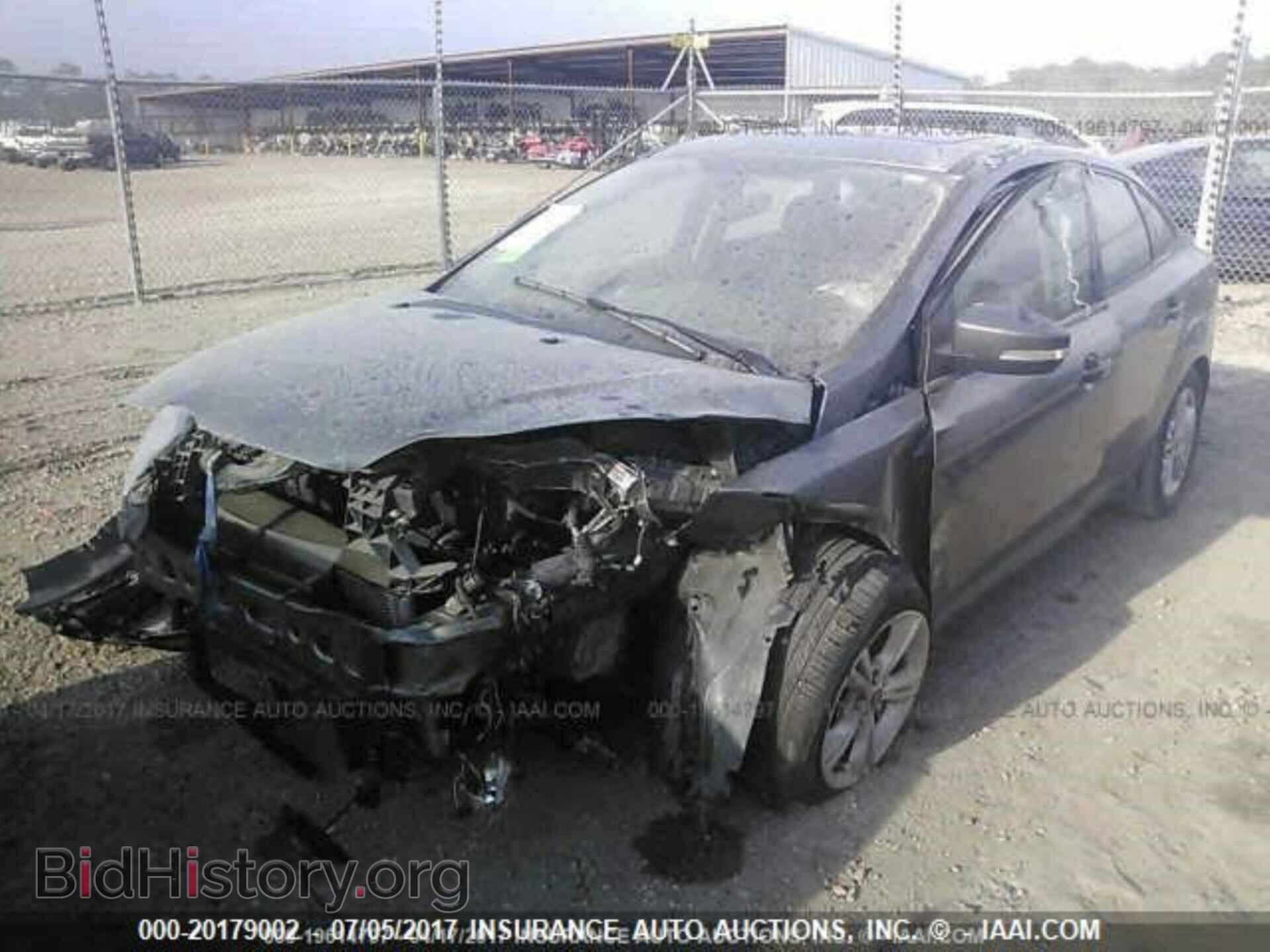 2014 Ford Focus - VIN: 1FADP3F20EL202937 - Фото 2