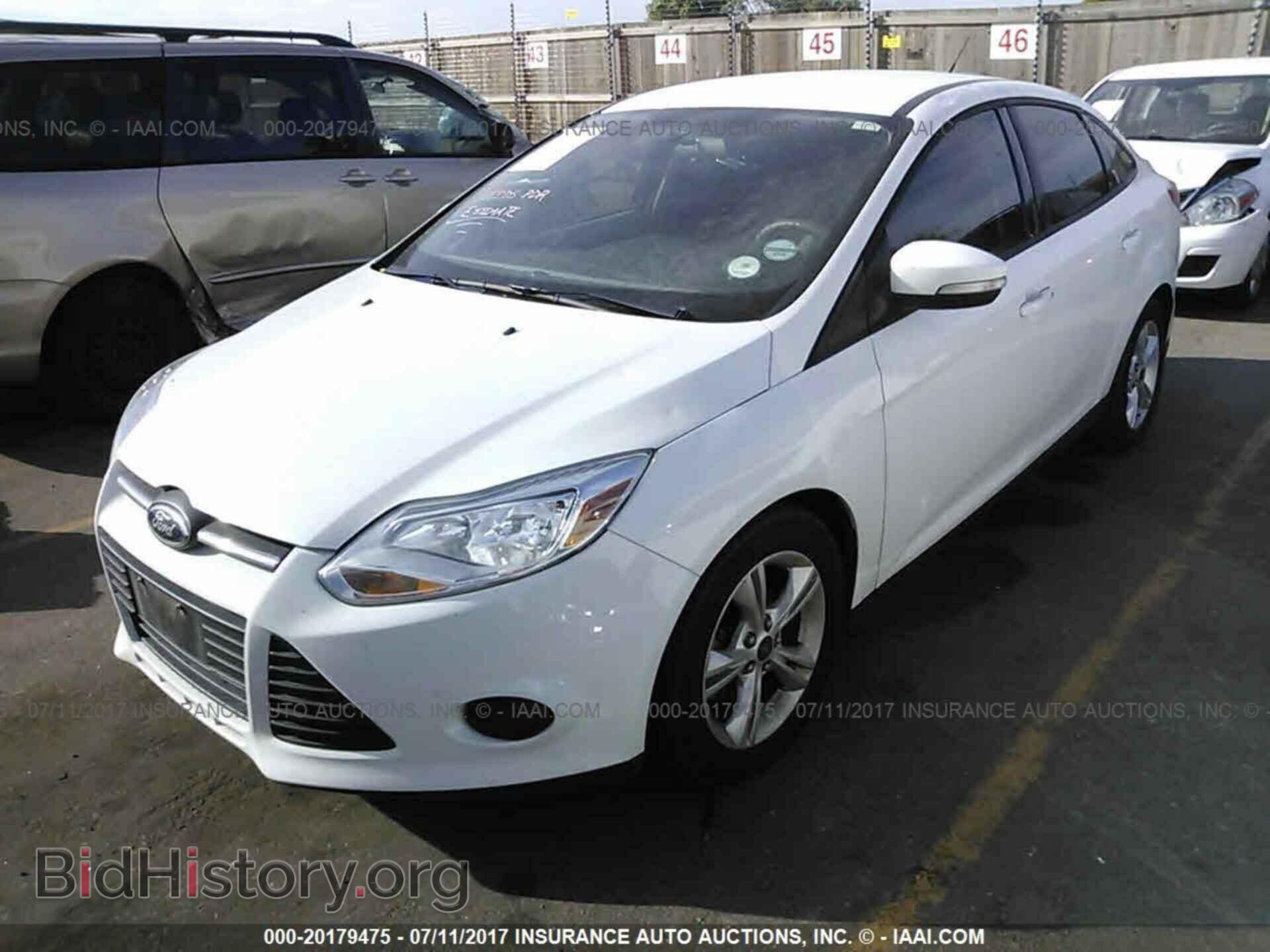 2013 Ford Focus - VIN: 1FADP3F24DL115573 - Photo 2