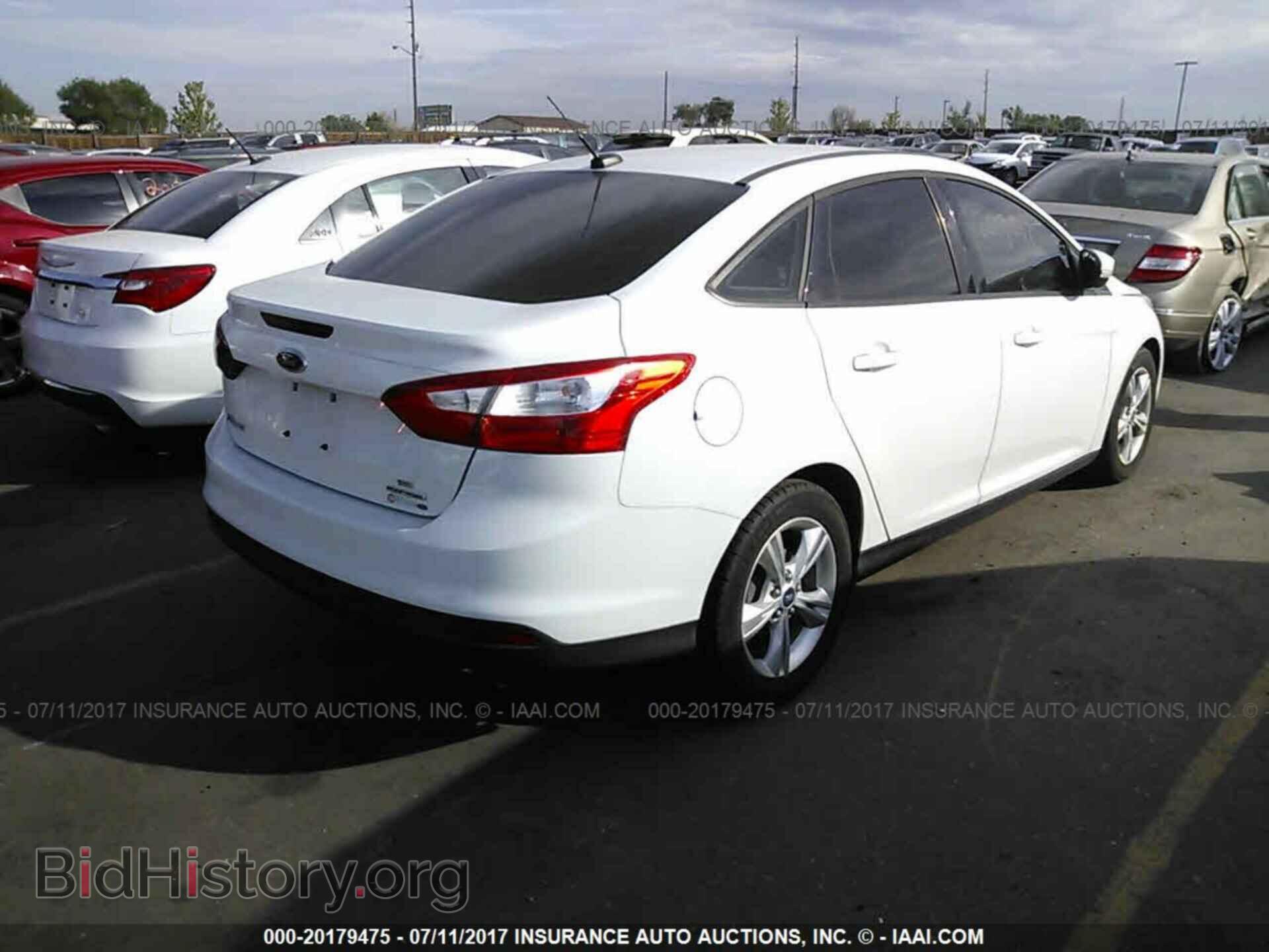 2013 Ford Focus - VIN: 1FADP3F24DL115573 - Photo 4