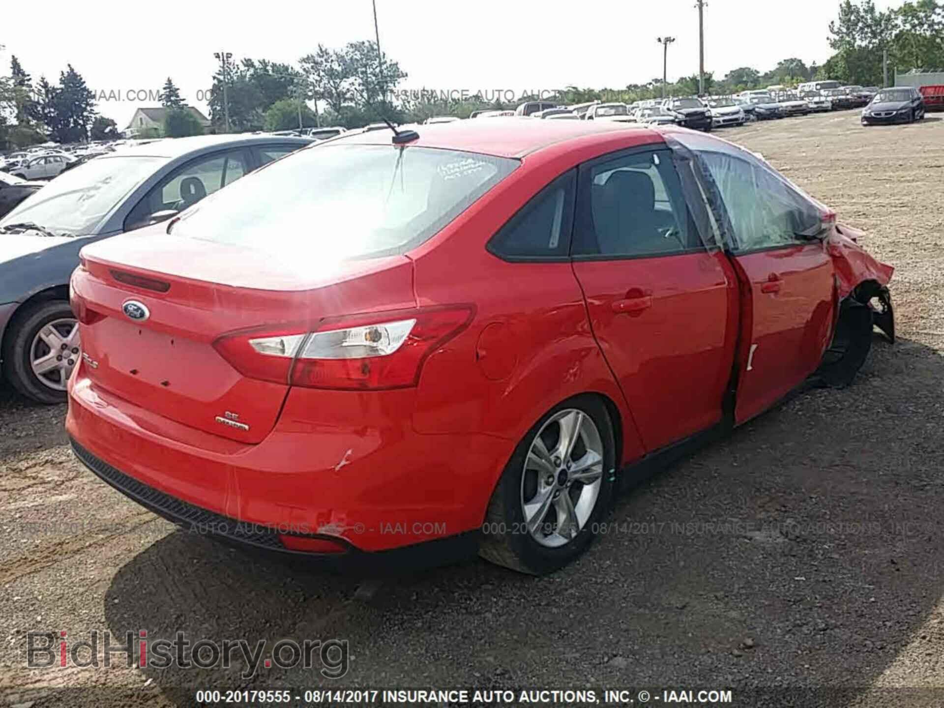 2014 Ford Focus - VIN: 1FADP3F28EL228122 - Photo 4