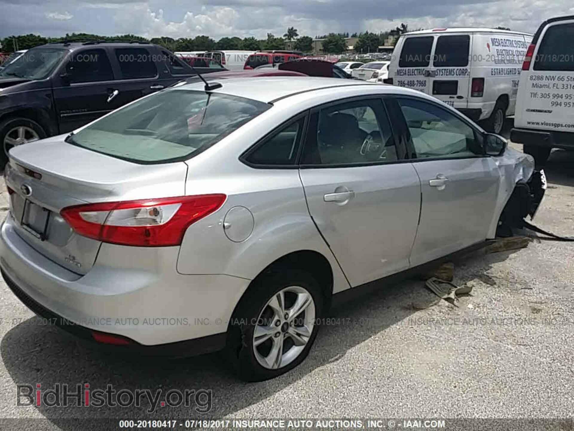 2014 Ford Focus - VIN: 1FADP3F29EL283694 - Фото 4