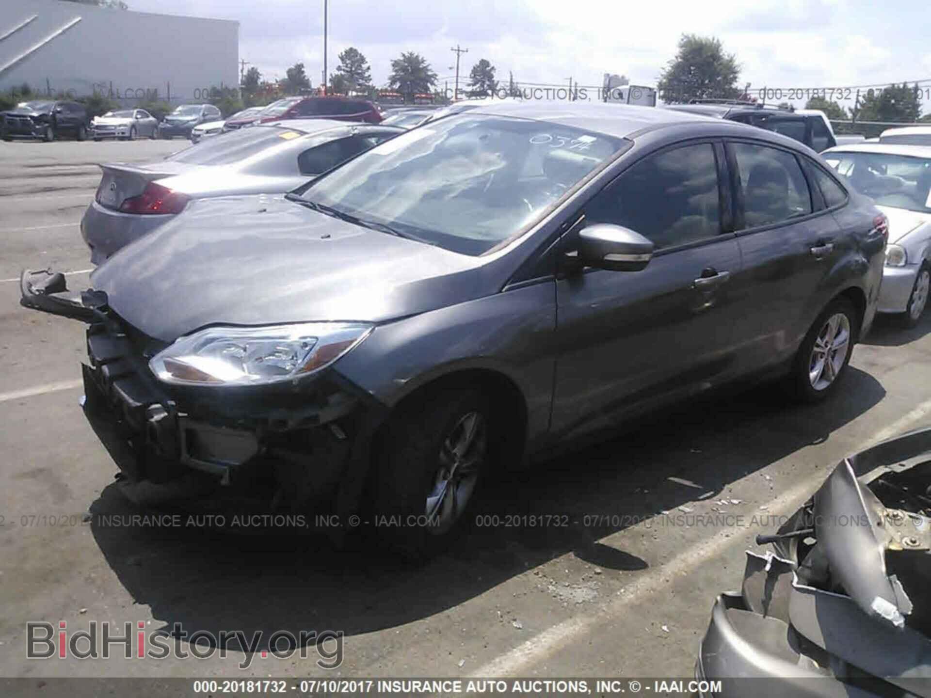2013 Ford Focus - VIN: 1FADP3F2XDL330374 - Фото 2