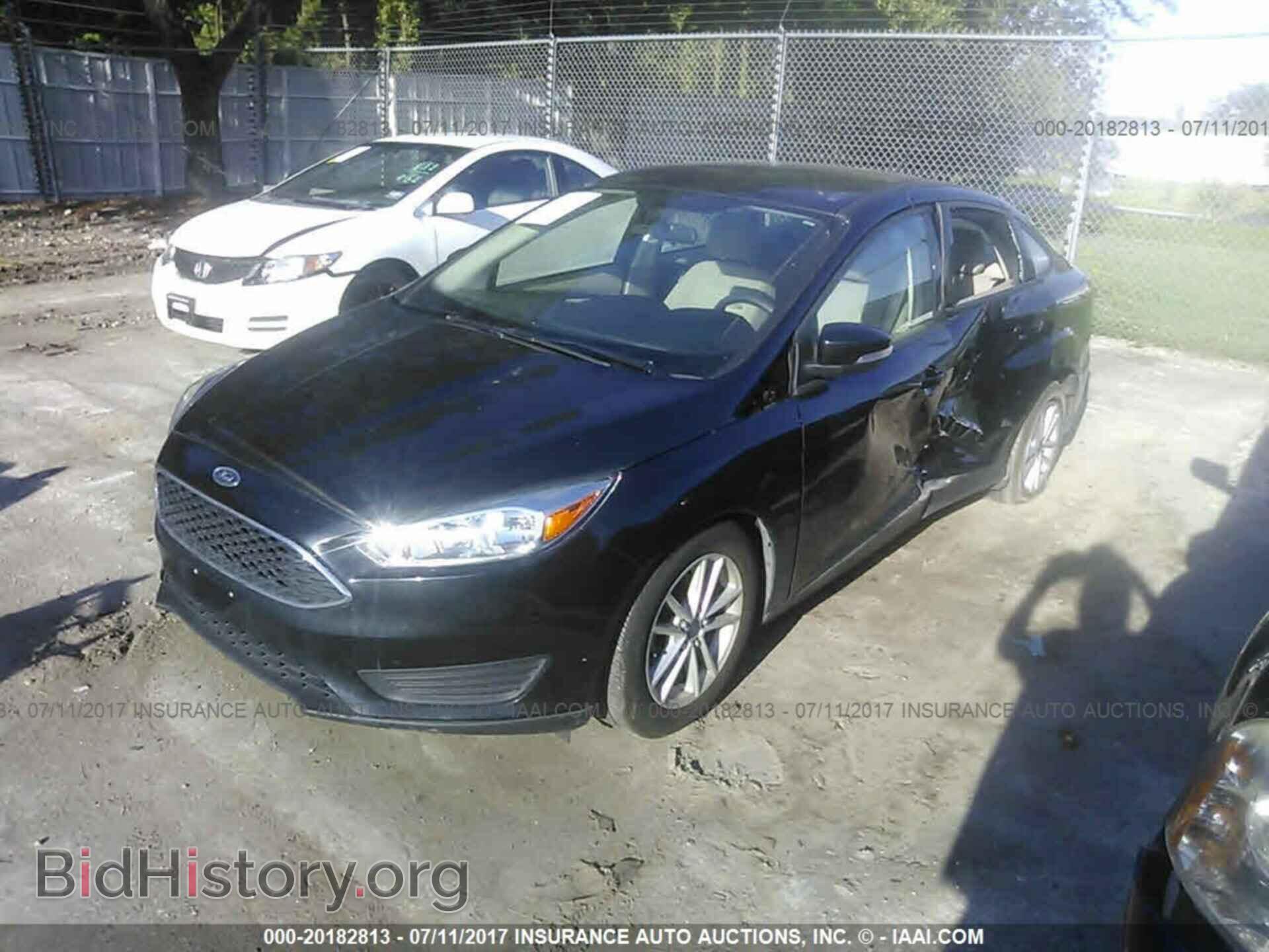 2015 Ford Focus - VIN: 1FADP3F28FL257184 - Фото 2