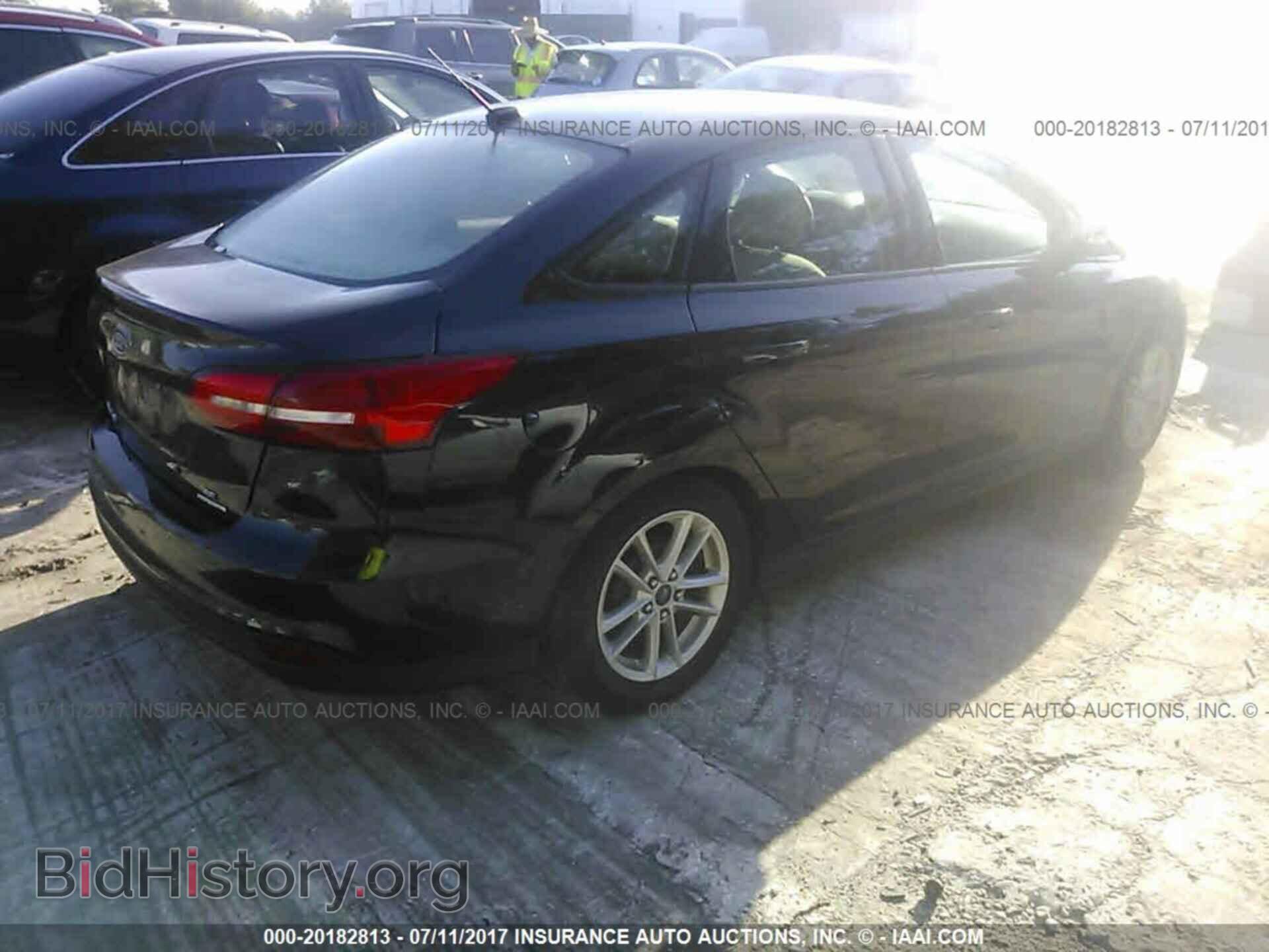 2015 Ford Focus - VIN: 1FADP3F28FL257184 - Фото 4