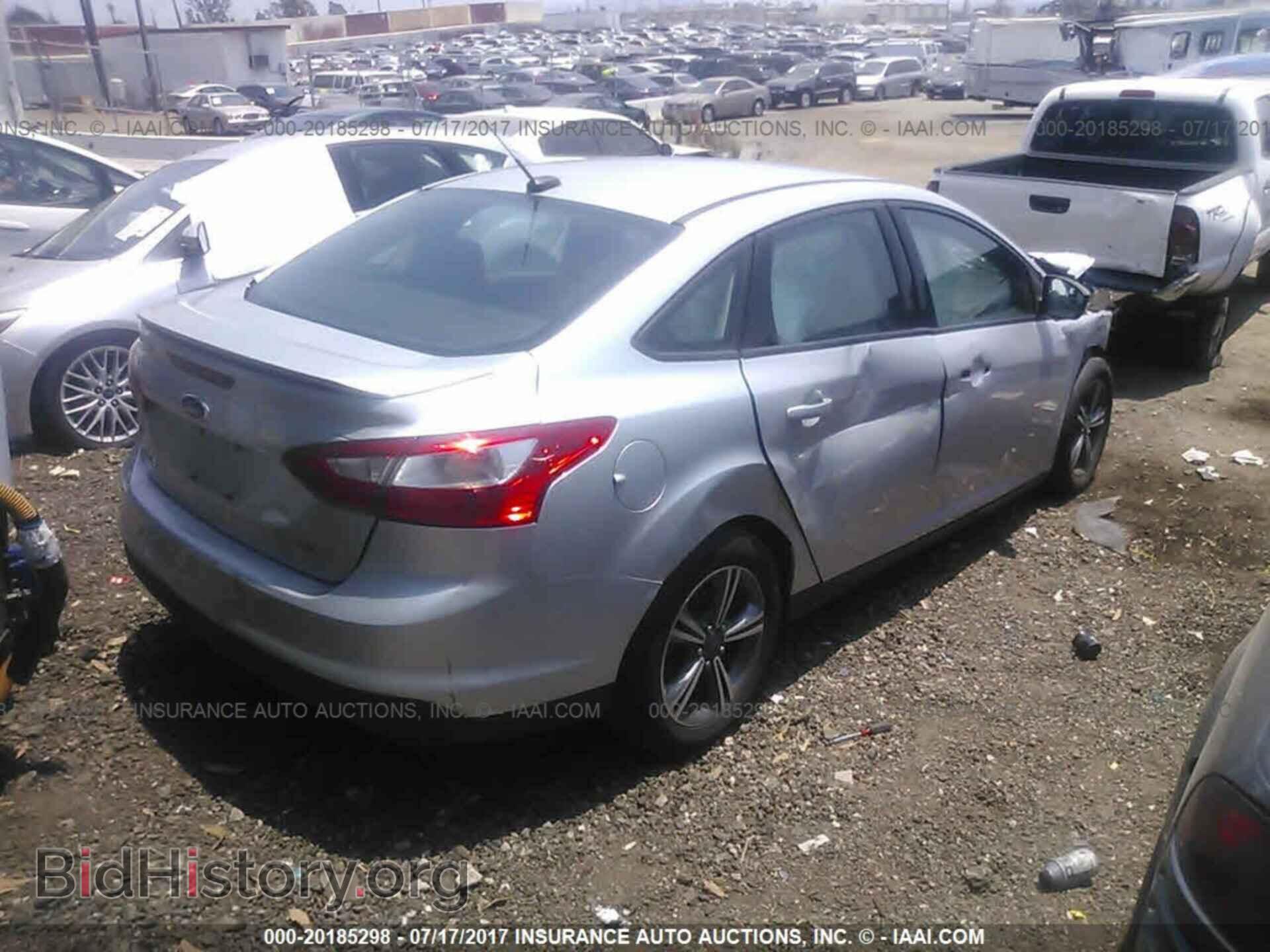 2014 Ford Focus - VIN: 1FADP3F24EL149708 - Photo 4