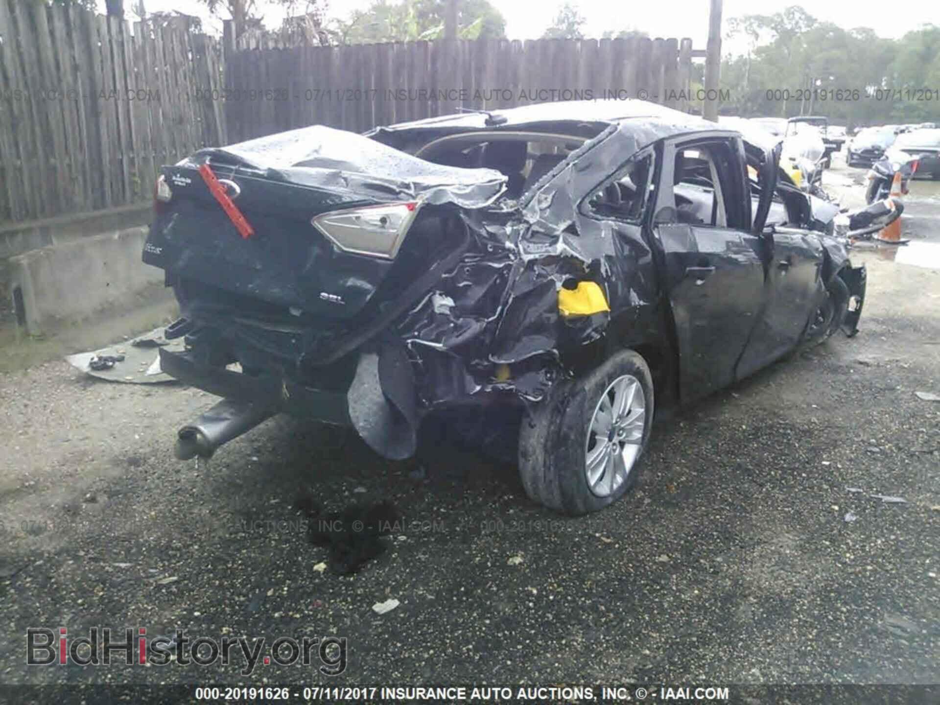 2012 Ford Focus - VIN: 1FAHP3H27CL357089 - Фото 4