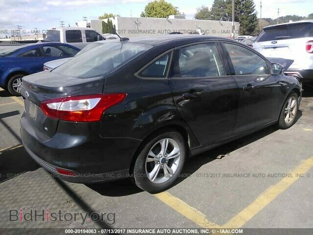 2014 Ford Focus - VIN: 1FADP3F24EL211205 - Фото 4