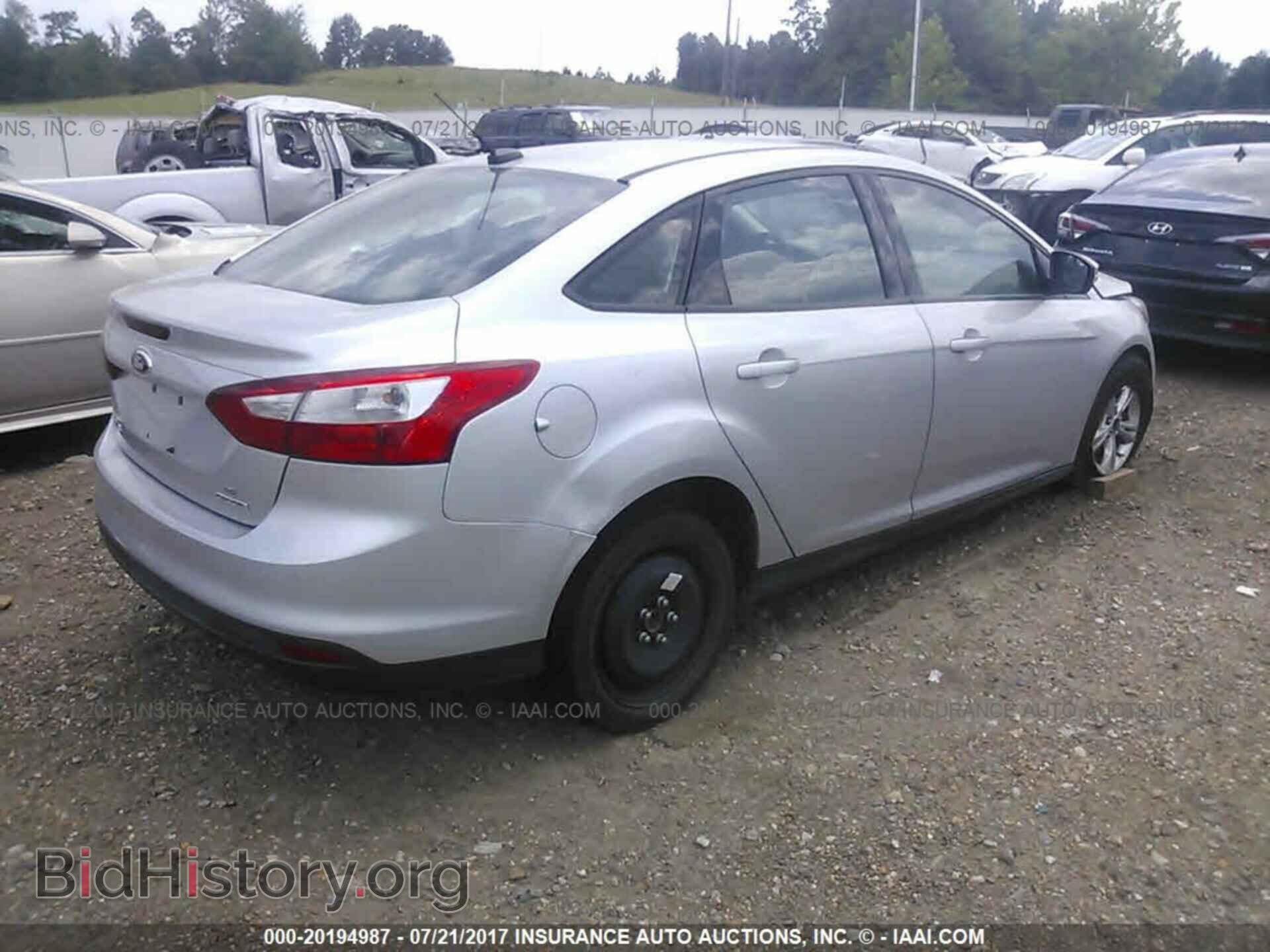 2014 Ford Focus - VIN: 1FADP3F20EL115216 - Фото 4