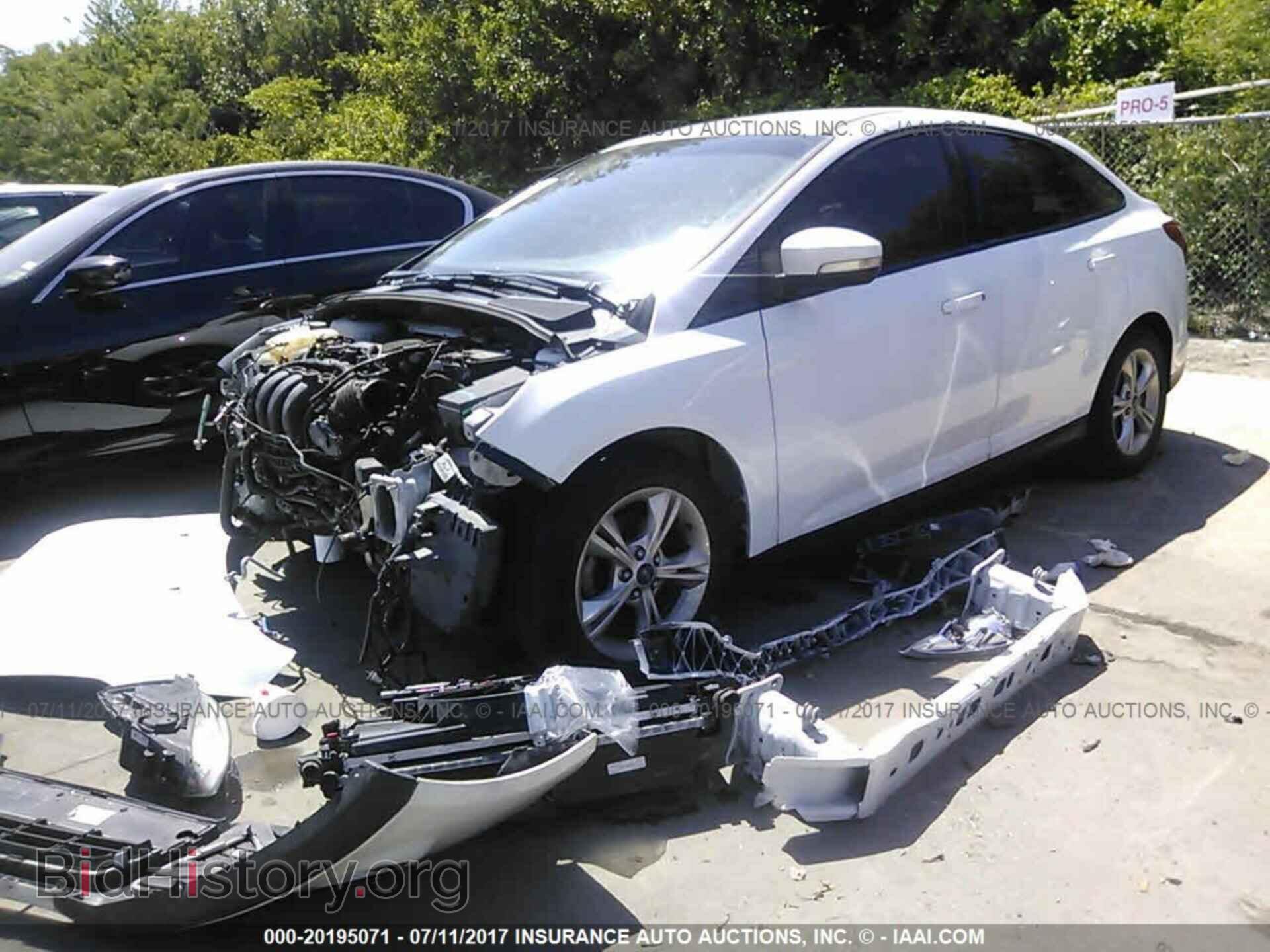 2013 Ford Focus - VIN: 1FADP3F20DL302891 - Photo 2