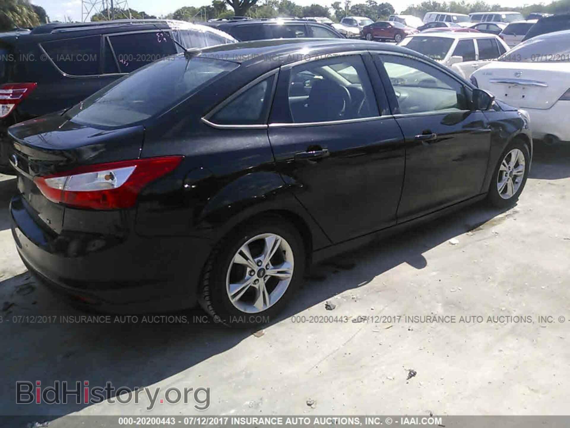 2014 Ford Focus - VIN: 1FADP3F25EL326802 - Фото 4