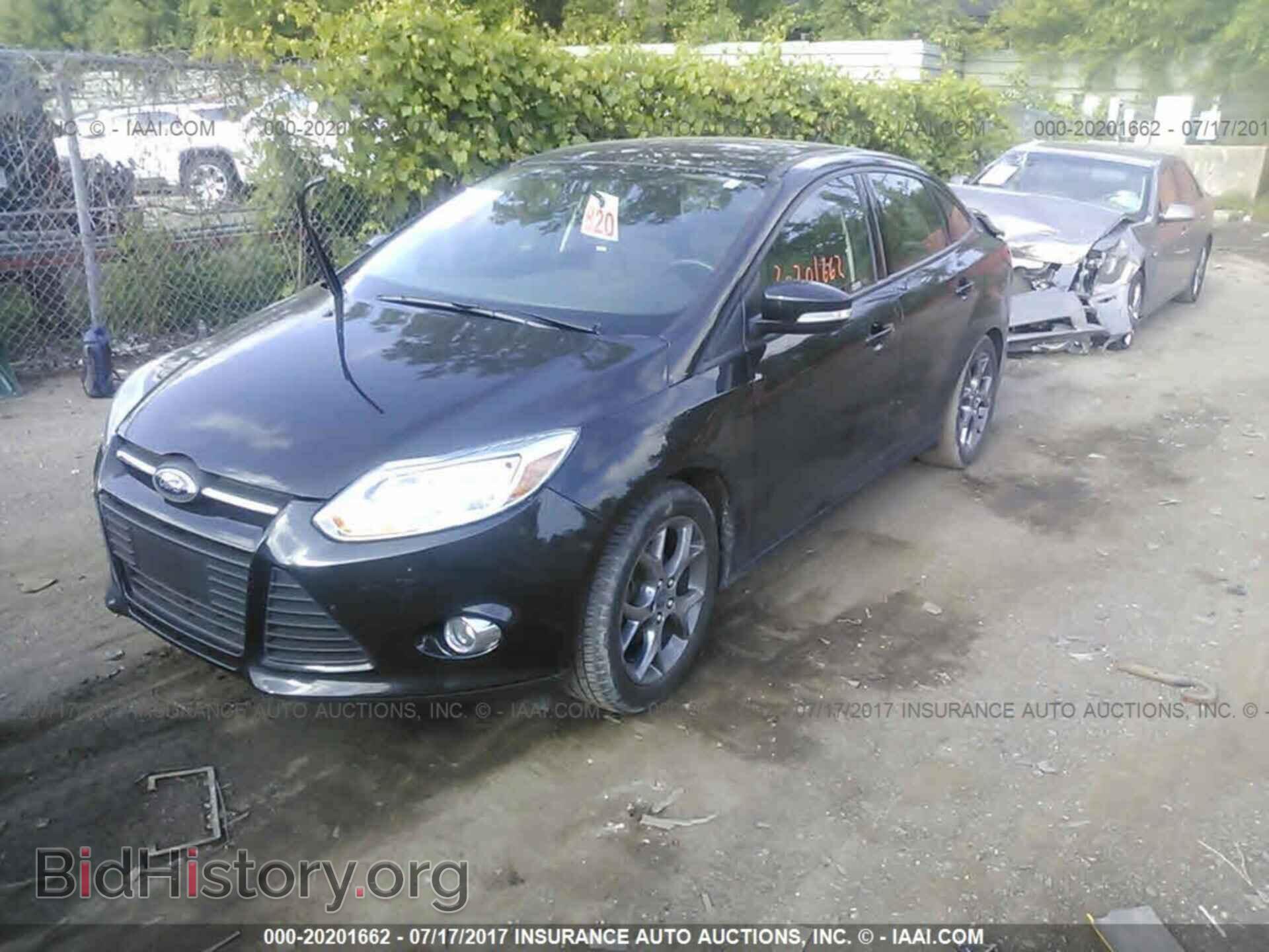 2014 Ford Focus - VIN: 1FADP3F29EL347720 - Фото 2