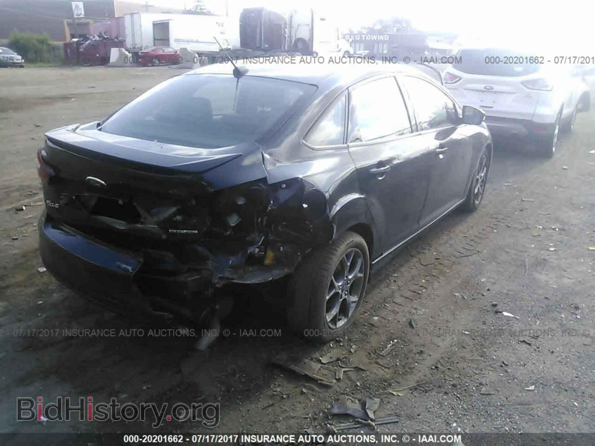 2014 Ford Focus - VIN: 1FADP3F29EL347720 - Фото 4