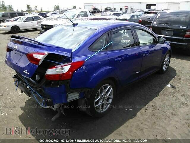 2014 Ford Focus - VIN: 1FADP3F28EL241243 - Photo 4