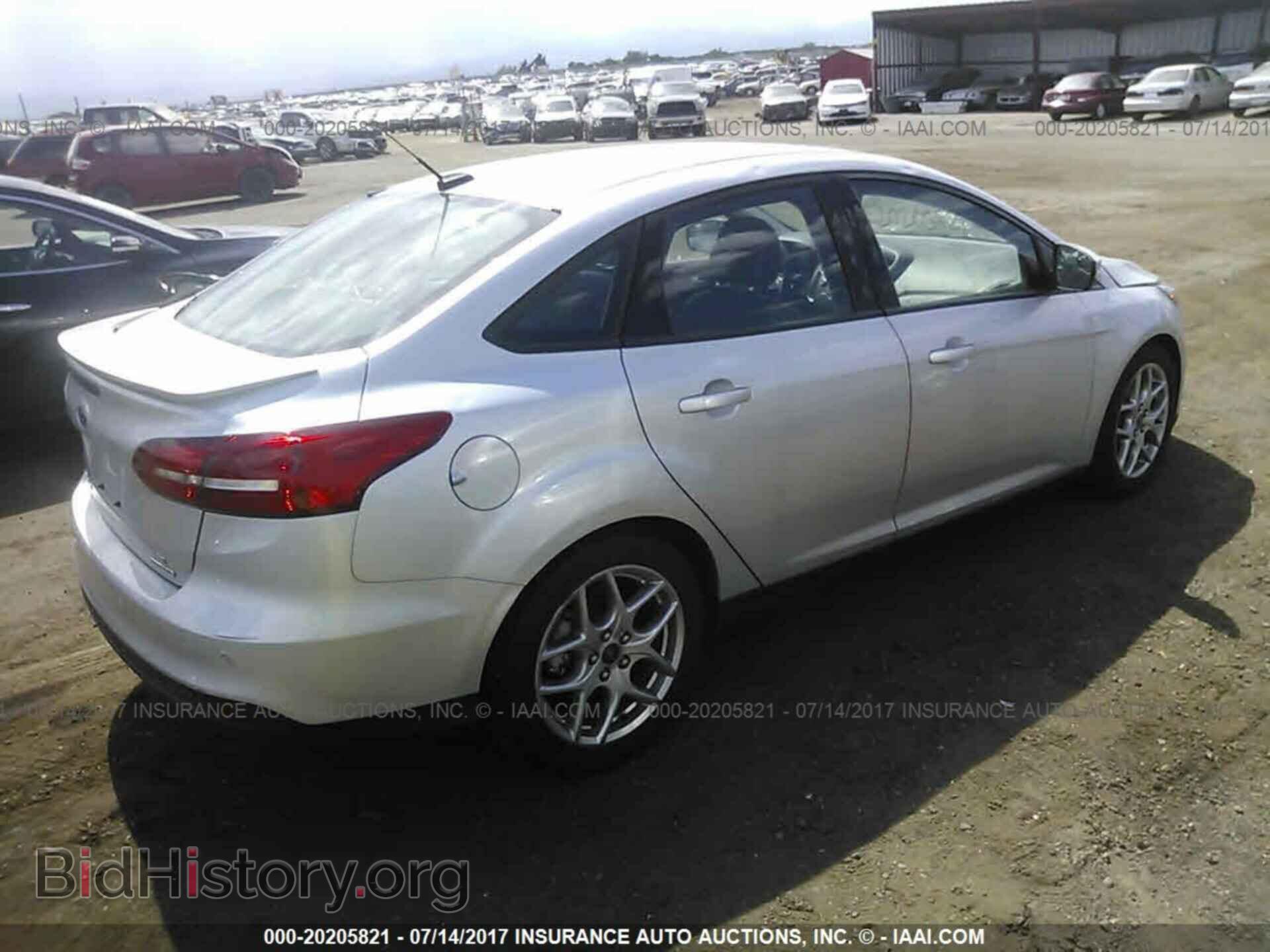 2015 Ford Focus - VIN: 1FADP3F29FL287875 - Photo 4