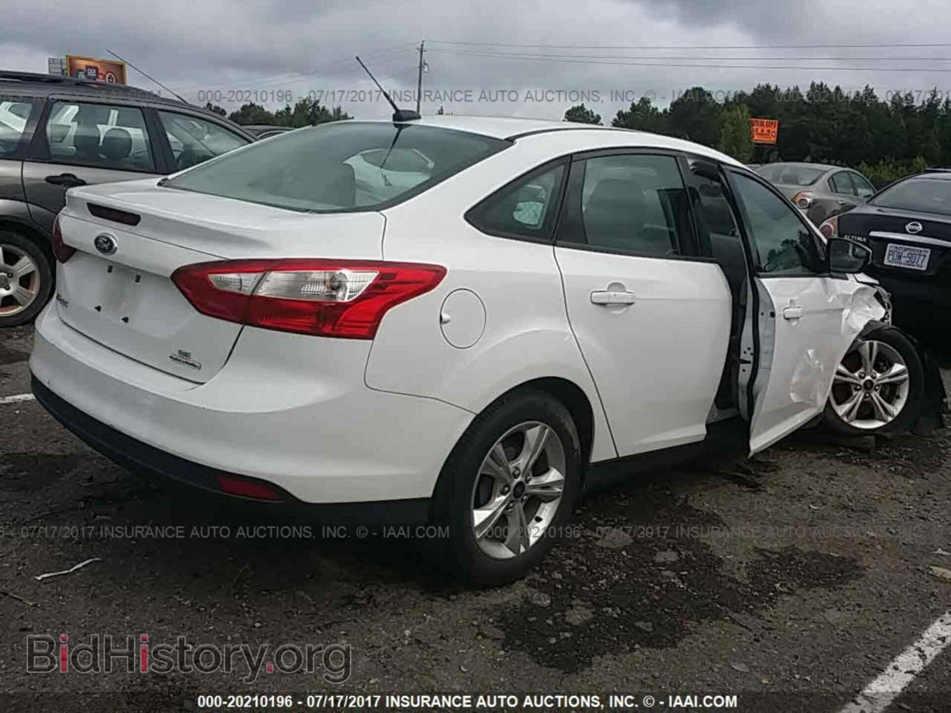 2013 Ford Focus - VIN: 1FADP3F28DL321396 - Фото 4