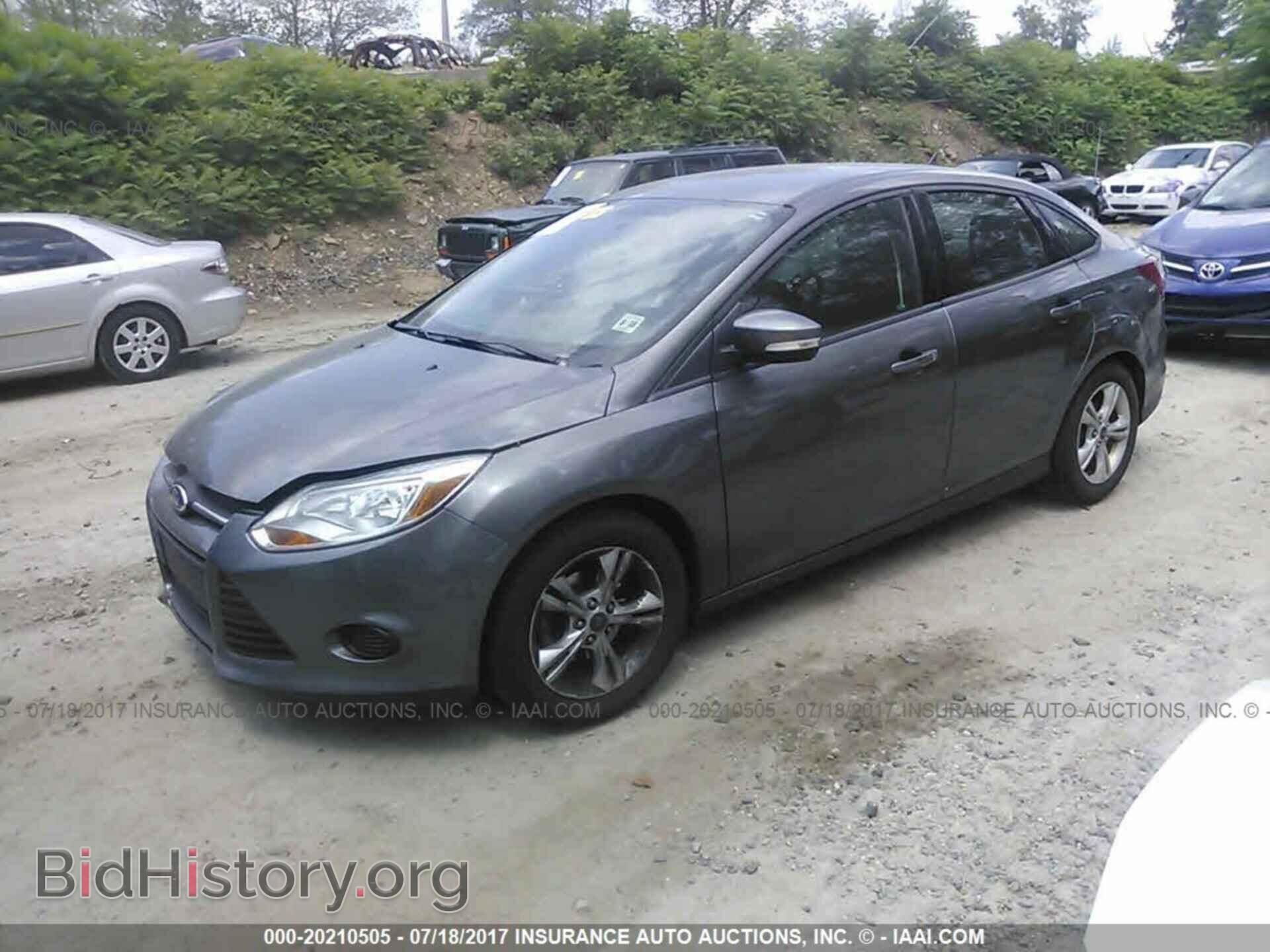 2014 Ford Focus - VIN: 1FADP3F20EL102191 - Photo 2