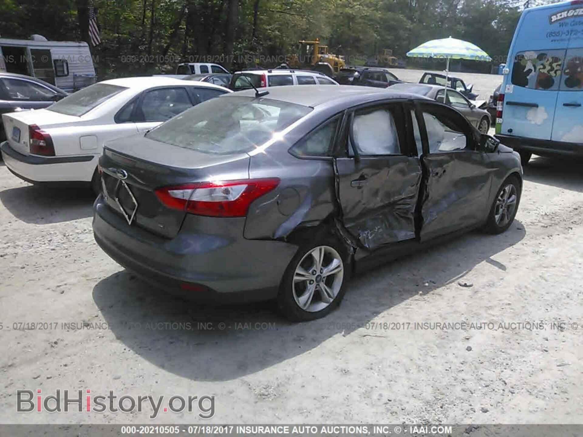 2014 Ford Focus - VIN: 1FADP3F20EL102191 - Photo 4