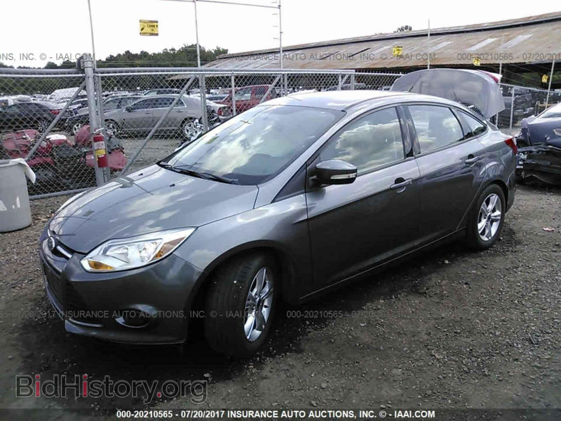2014 Ford Focus - VIN: 1FADP3F29EL231210 - Photo 2