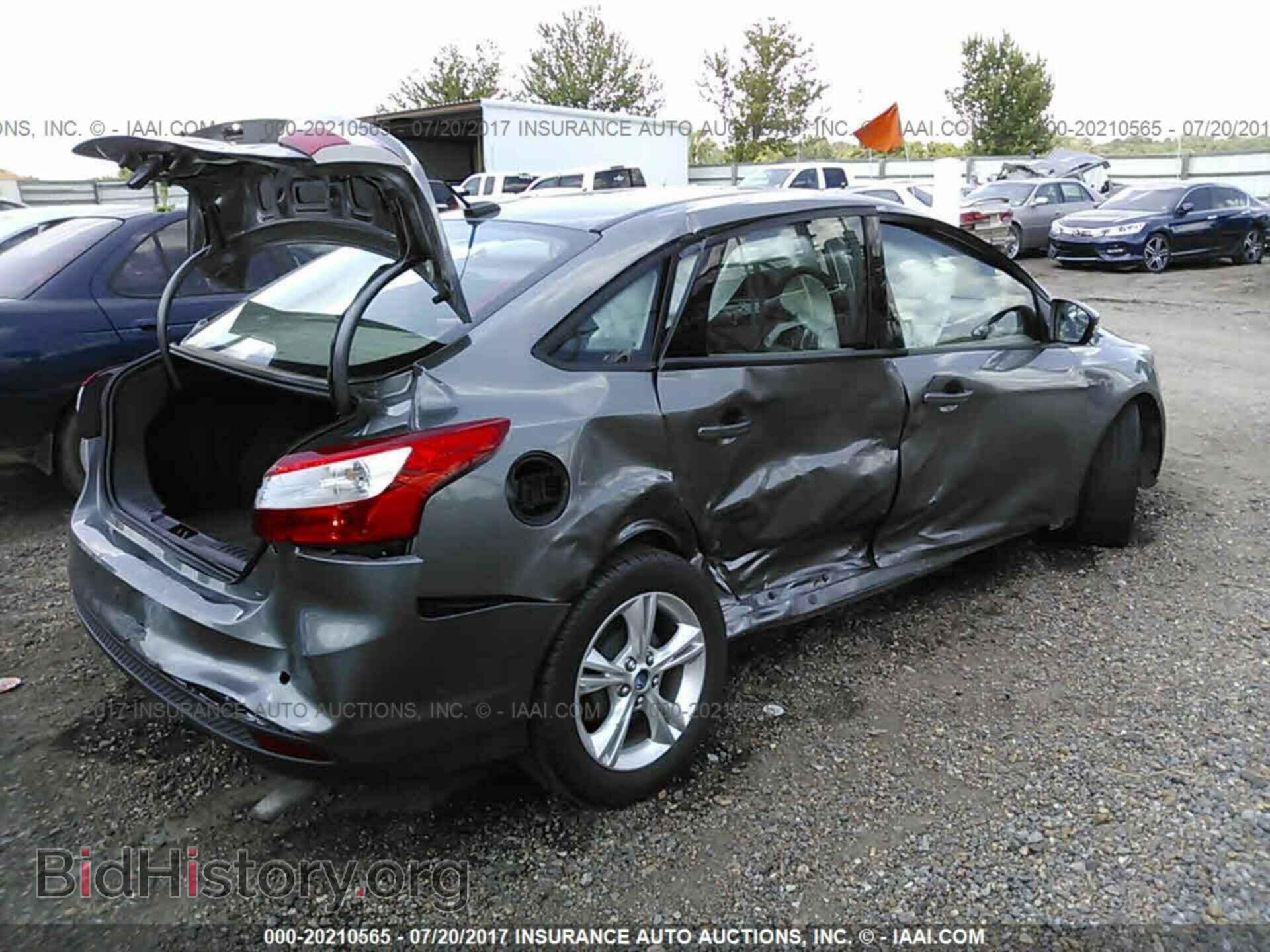 2014 Ford Focus - VIN: 1FADP3F29EL231210 - Photo 4