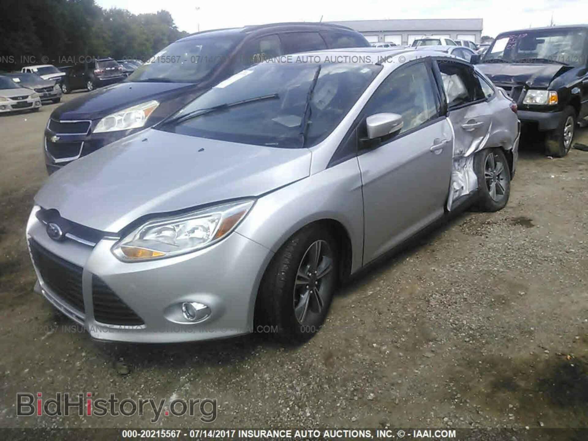 2014 Ford Focus - VIN: 1FADP3F22EL258684 - Фото 2