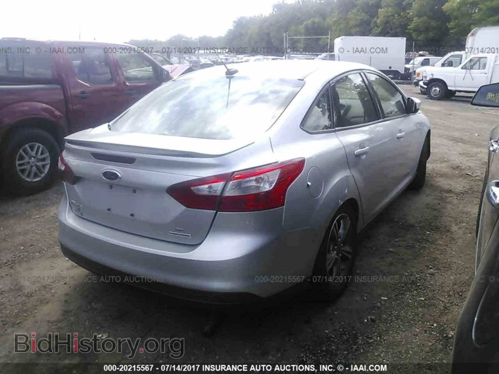 2014 Ford Focus - VIN: 1FADP3F22EL258684 - Фото 4