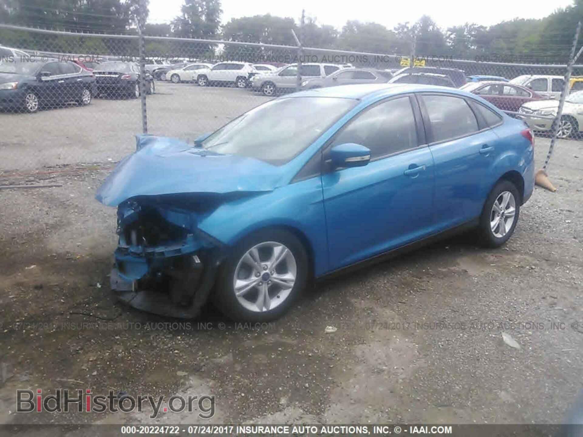 2014 Ford Focus - VIN: 1FADP3F2XEL450693 - Photo 2