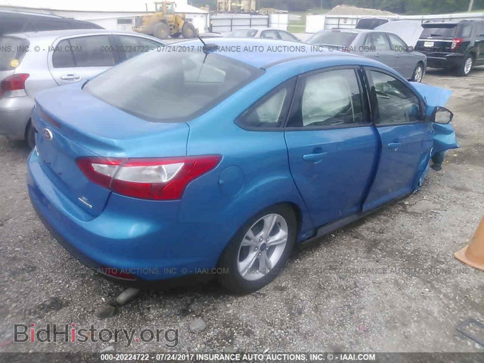 2014 Ford Focus - VIN: 1FADP3F2XEL450693 - Photo 4
