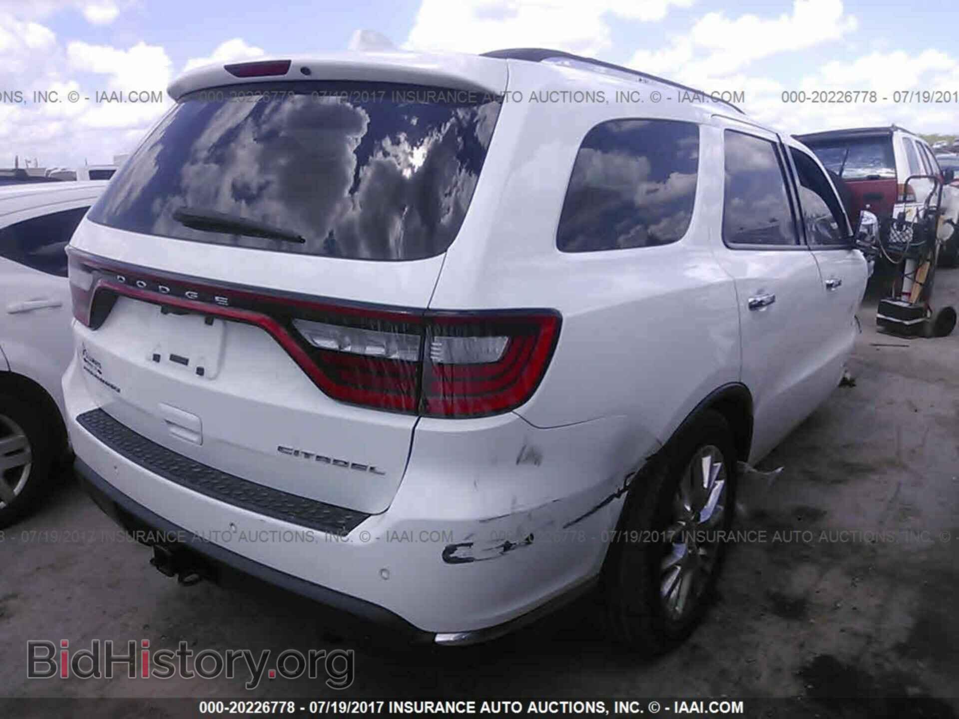 2014 Dodge Durango - VIN: 1C4SDHET3EC266990 - Фото 4