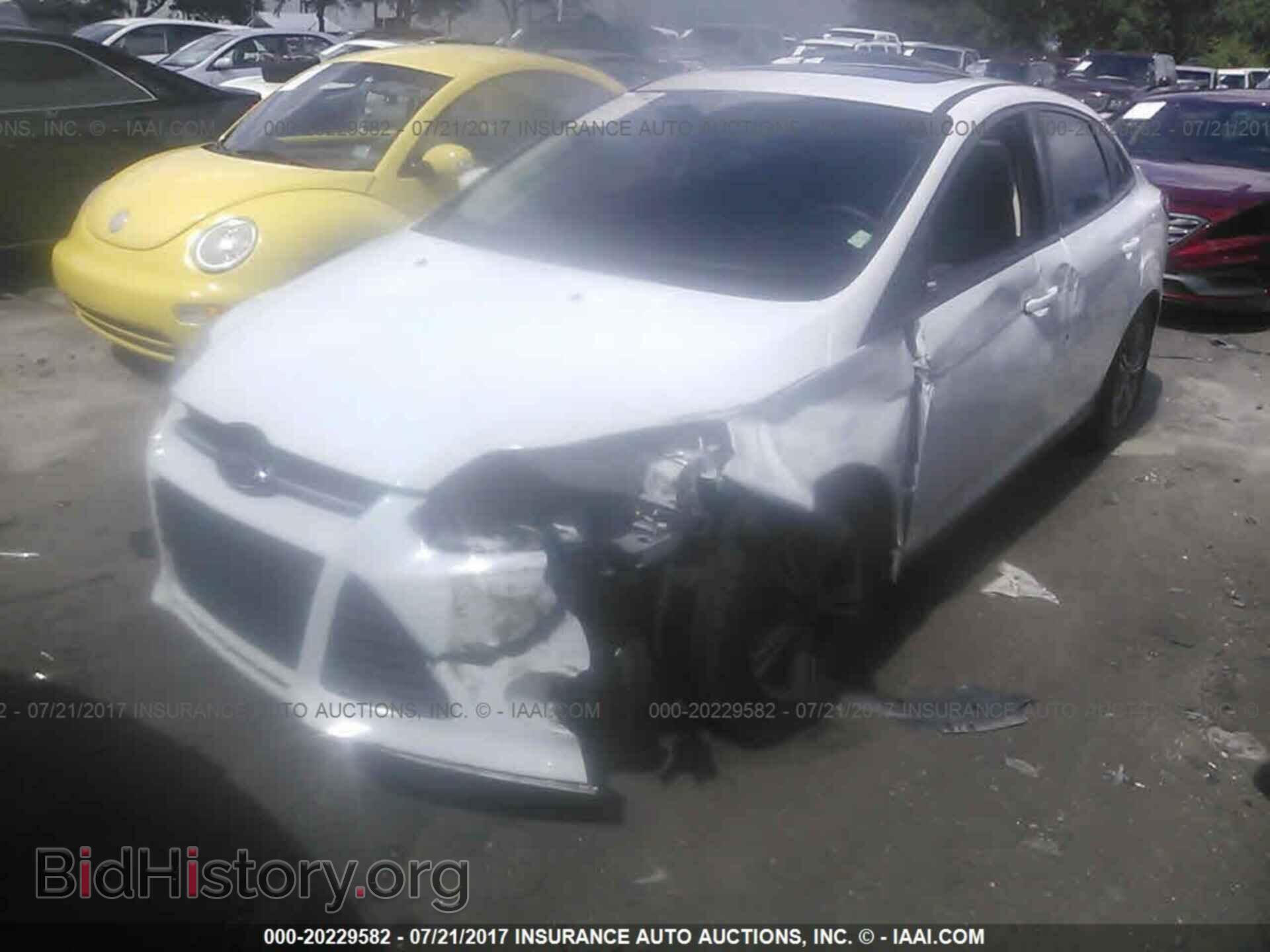 2014 Ford Focus - VIN: 1FADP3F28EL233837 - Photo 2