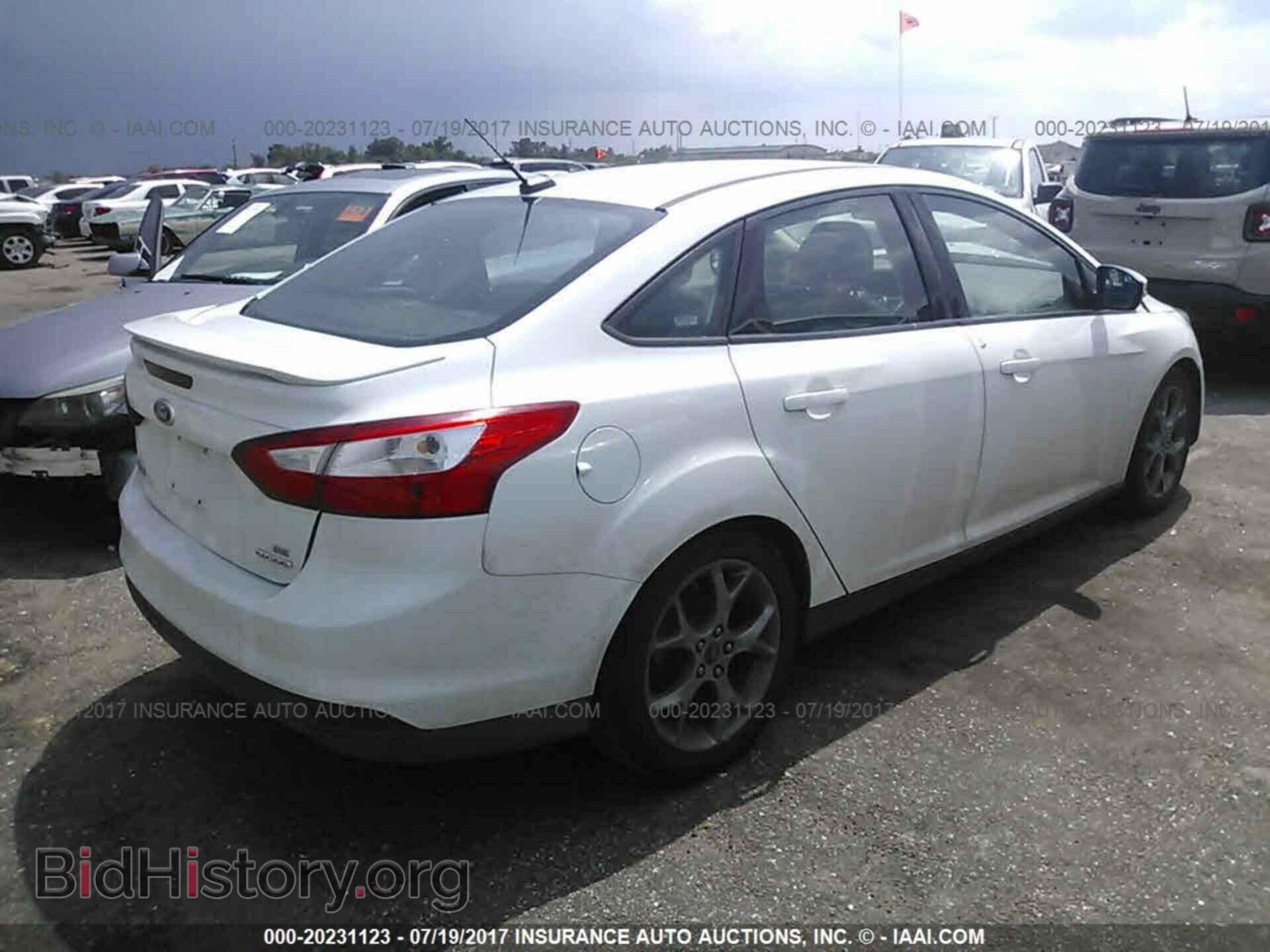 2014 Ford Focus - VIN: 1FADP3F25EL214128 - Фото 4