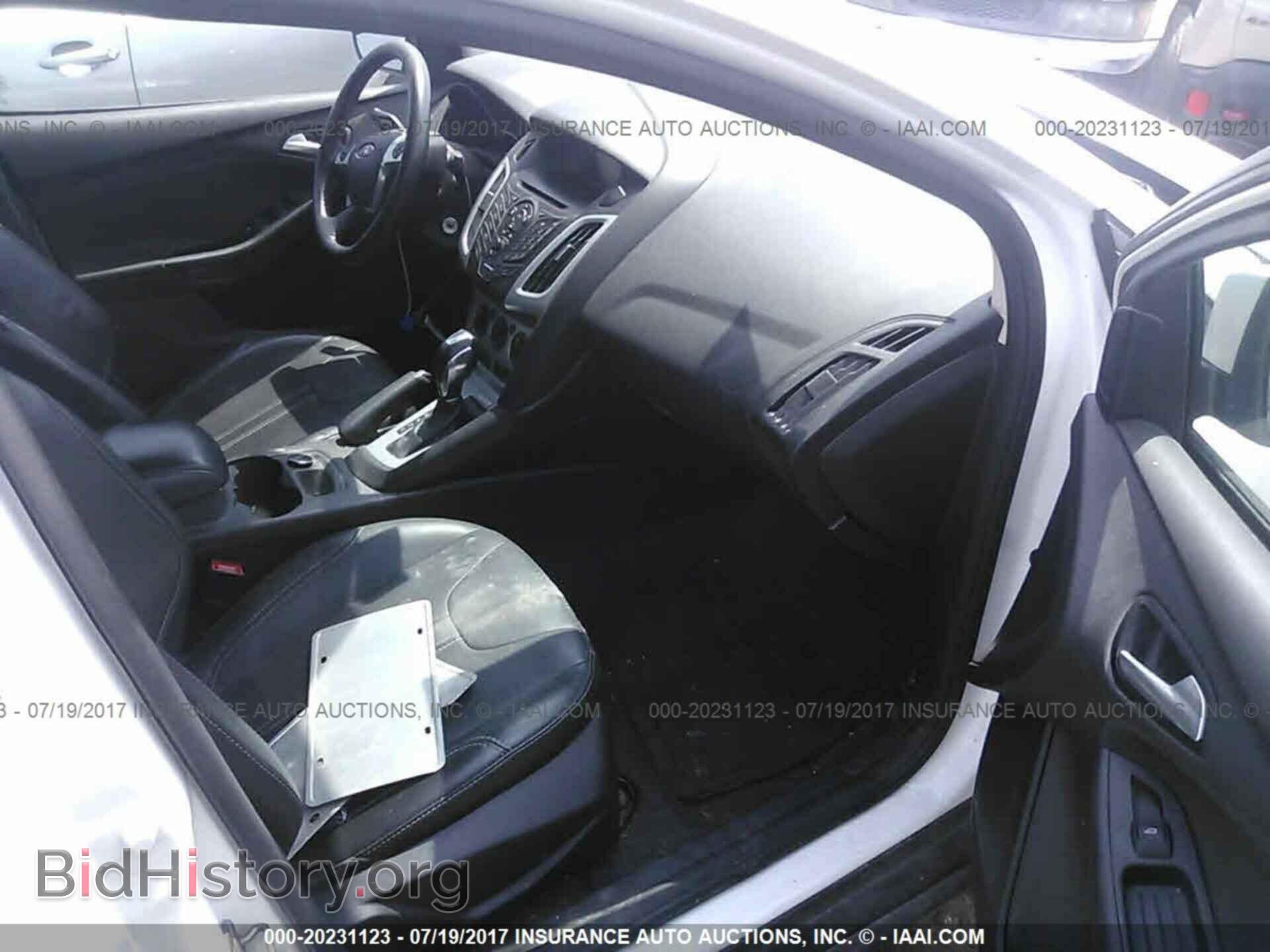 2014 Ford Focus - VIN: 1FADP3F25EL214128 - Фото 5